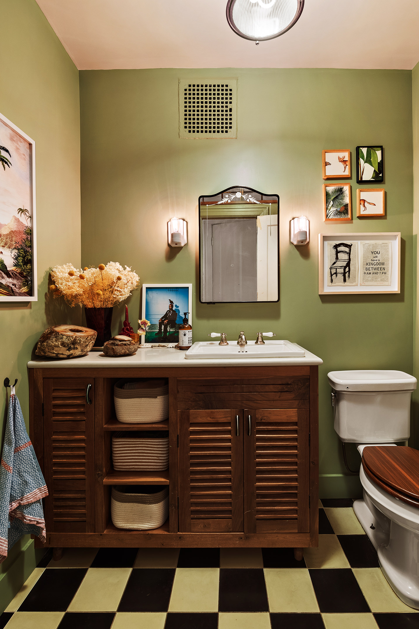 264 Clinton Avenue Brooklyn, NY 11205 - Photo 7 of 21 a bathroom with a sink and a mirror