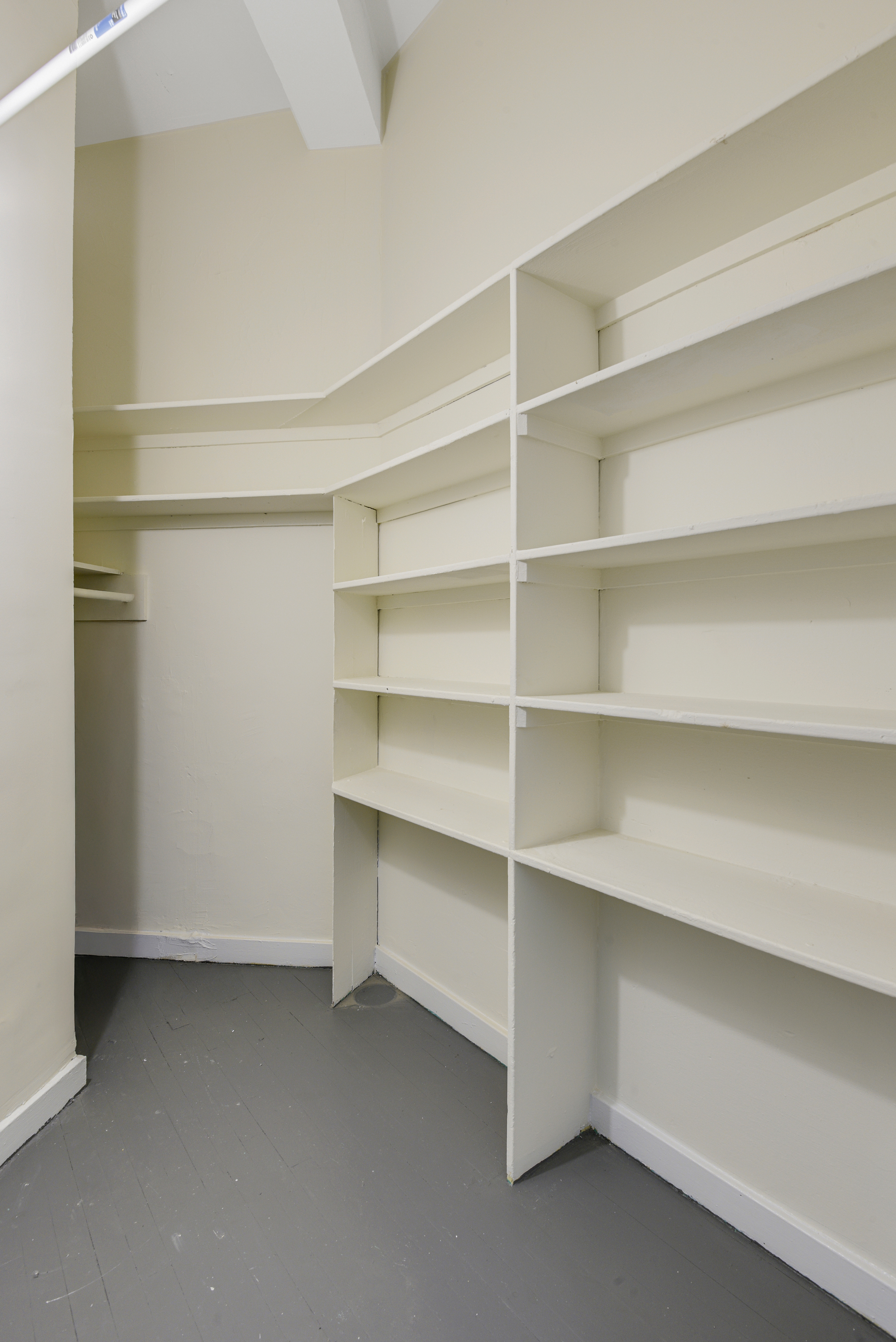 1349 Lexington Avenue, Unit 1F Manhattan, NY 10128 - Photo 8 of 16 a view of room and empty shelves