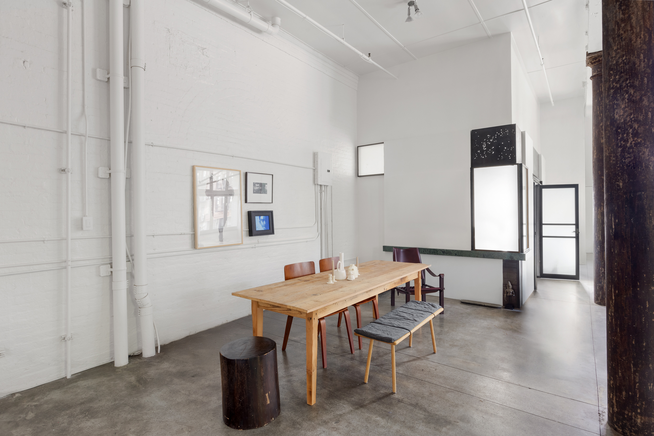 125 Watts Street, Unit 1 Manhattan, NY 10013 - Photo 10 of 24 a dining room with furniture and window