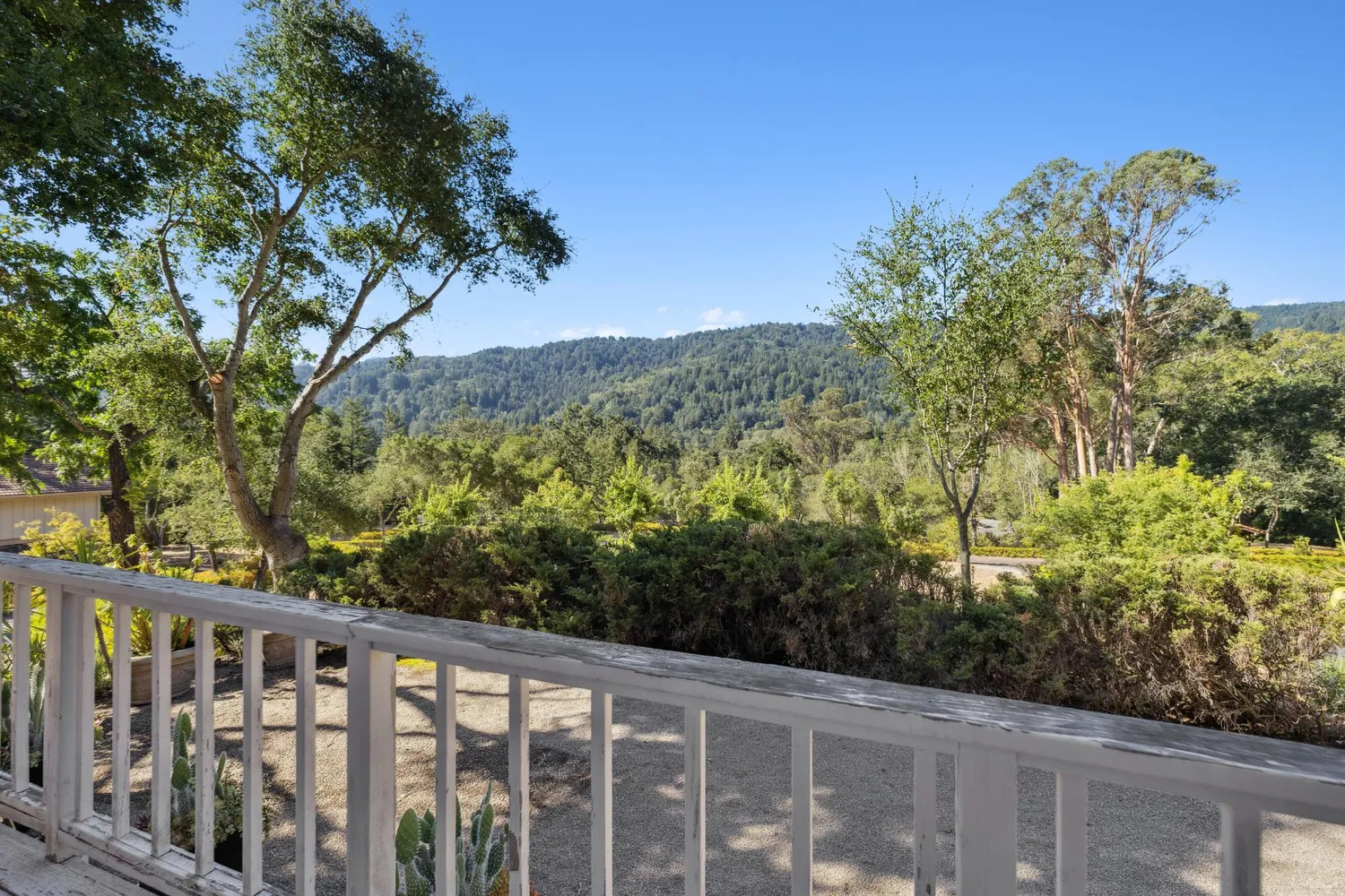 a view of a balcony with an outdoor space
