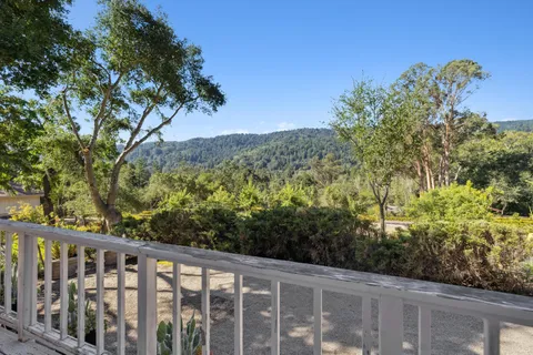 a view of a balcony with an outdoor space