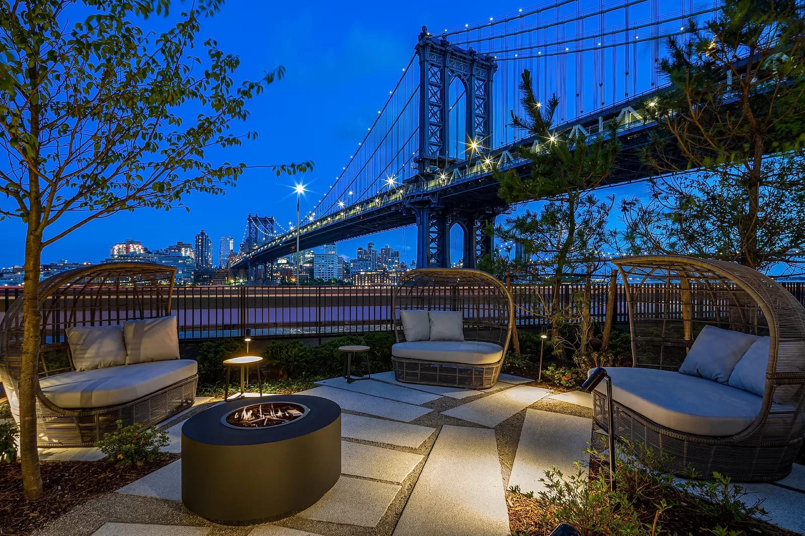 252 South Street, Unit 60G Manhattan, NY 10002 - Photo 19 of 30 a view of a patio with couches chairs and potted plants