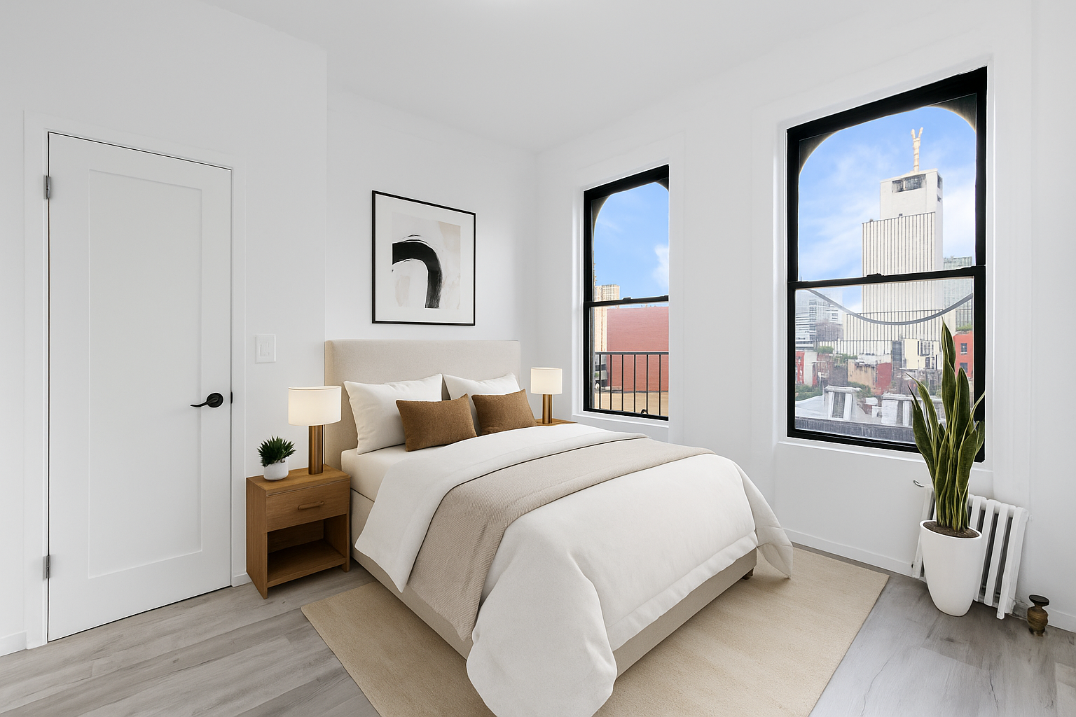 826 9th Avenue, Unit 5RS Manhattan, NY 10019 - Photo 3 of 15 a bedroom with a bed and a painting on the wall