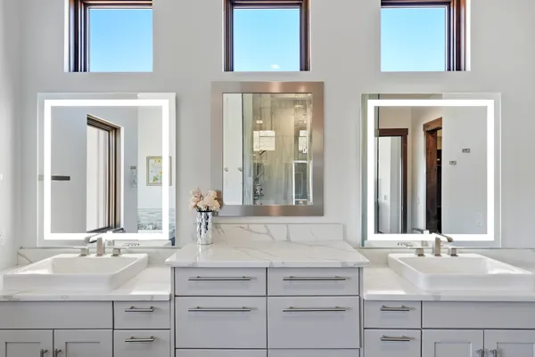an aerial view of residential house and sandy dunes