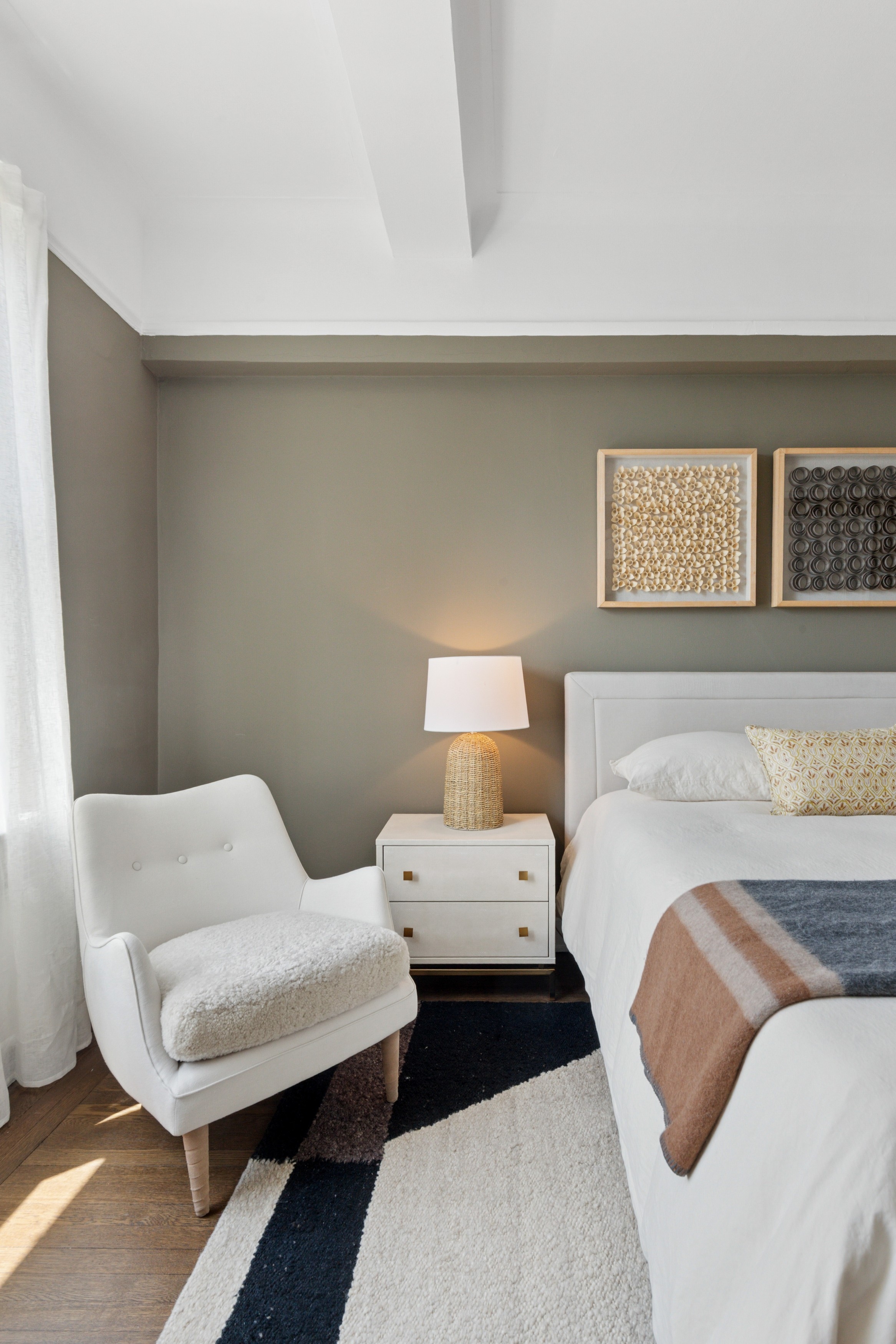 336 Central Park West, Unit 16F Manhattan, NY 10025 - Photo 14 of 18 a bedroom with a bed and couch