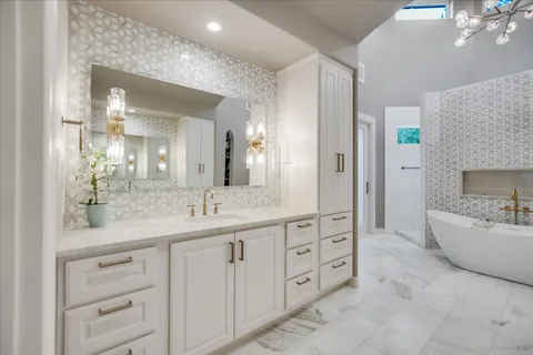 a bathroom with a shower and a mirror