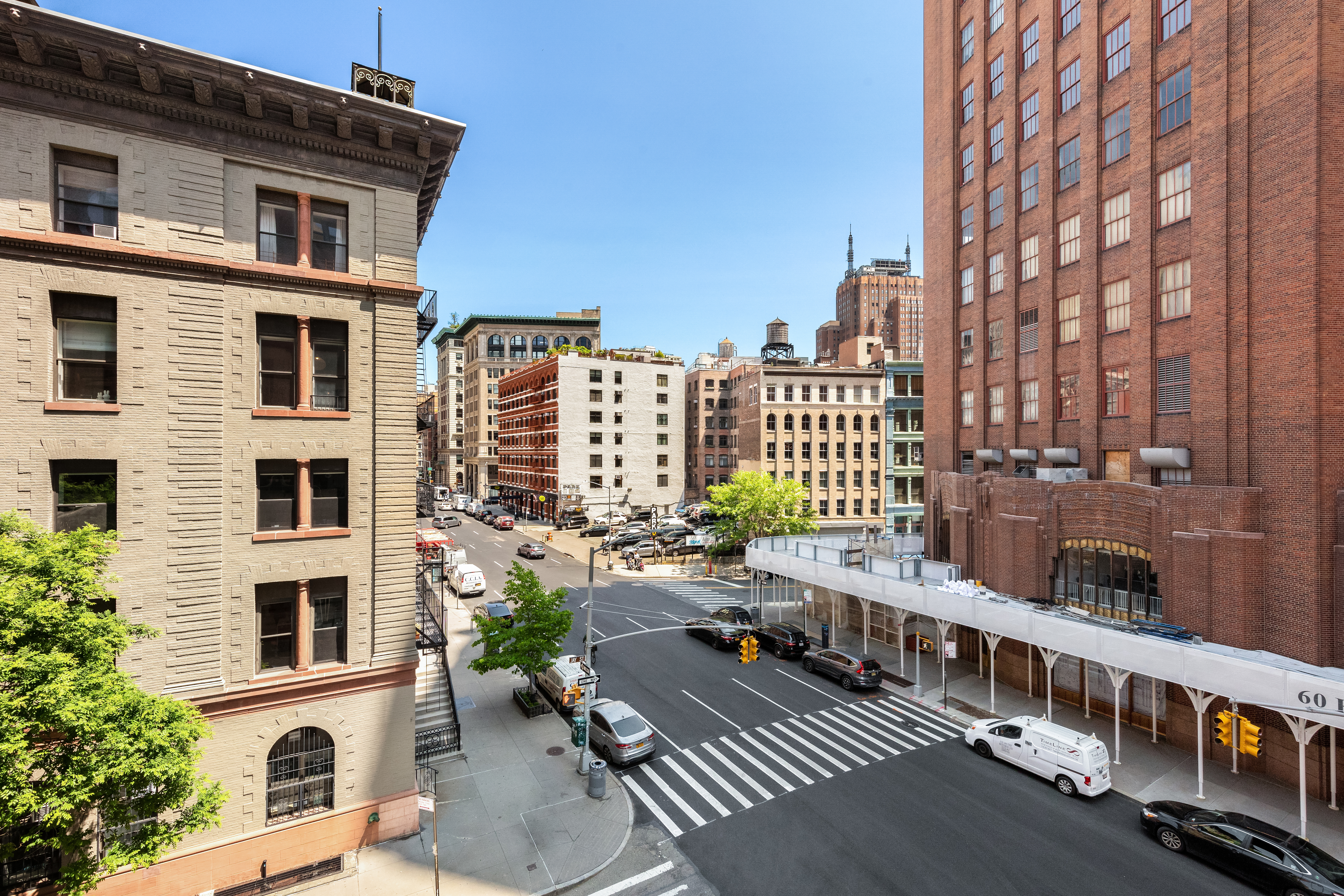 55 Hudson Street, Unit 3BCD Manhattan, NY 10013 - Photo 18 of 21 a view of a building from a balcony