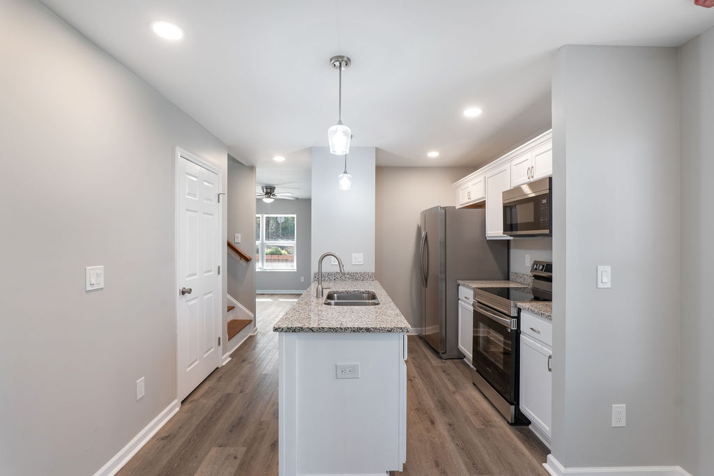 320 Adams Avenue Batesburg, SC 29006 - Photo 12 of 28 a kitchen with refrigerator and window
