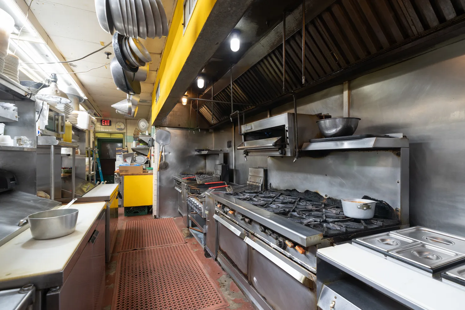 a bathroom with a tub and shower