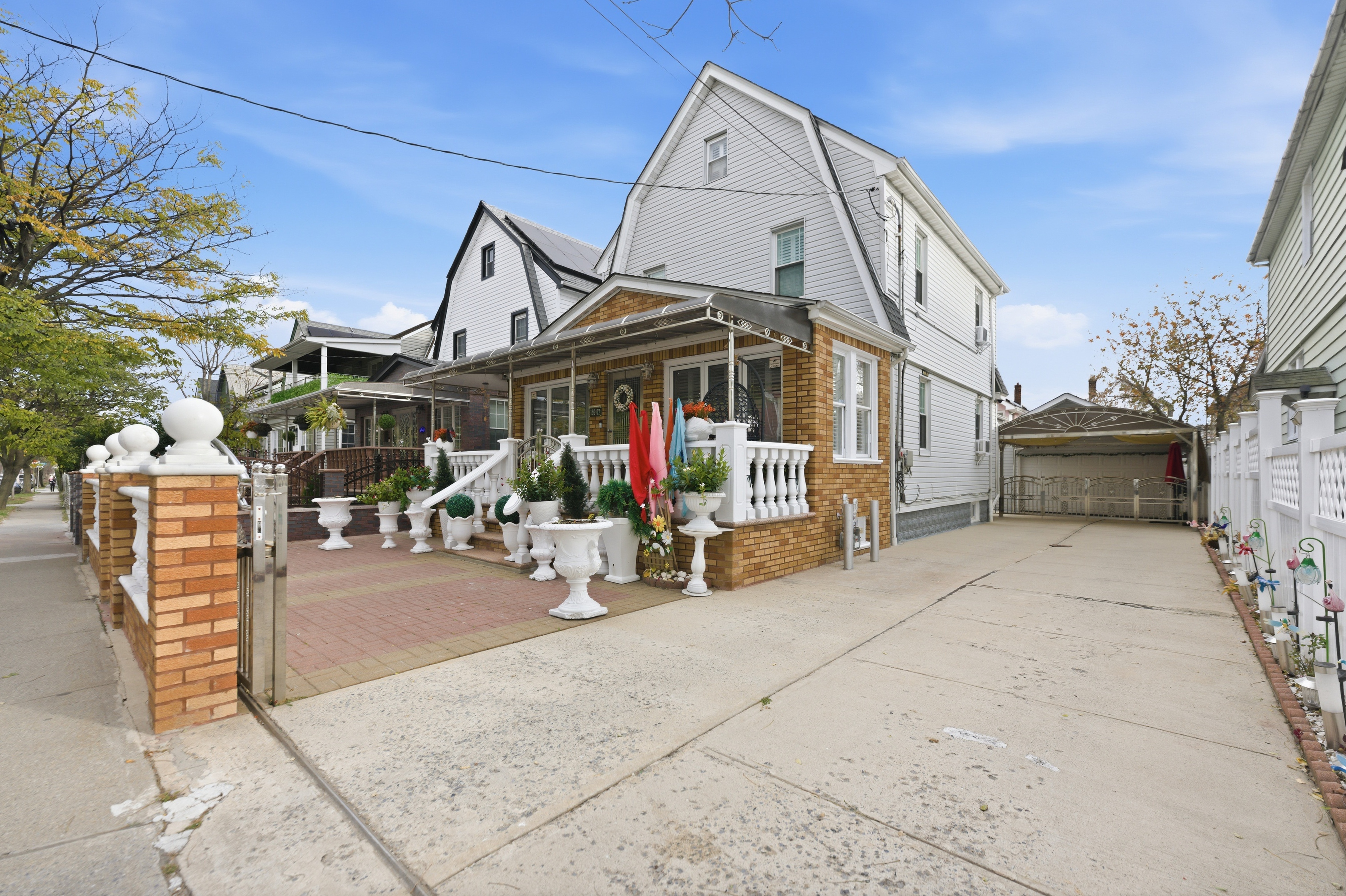 150-22 114th Road Queens, NY 11434 - Photo 15 of 22 a view of a building with sitting area