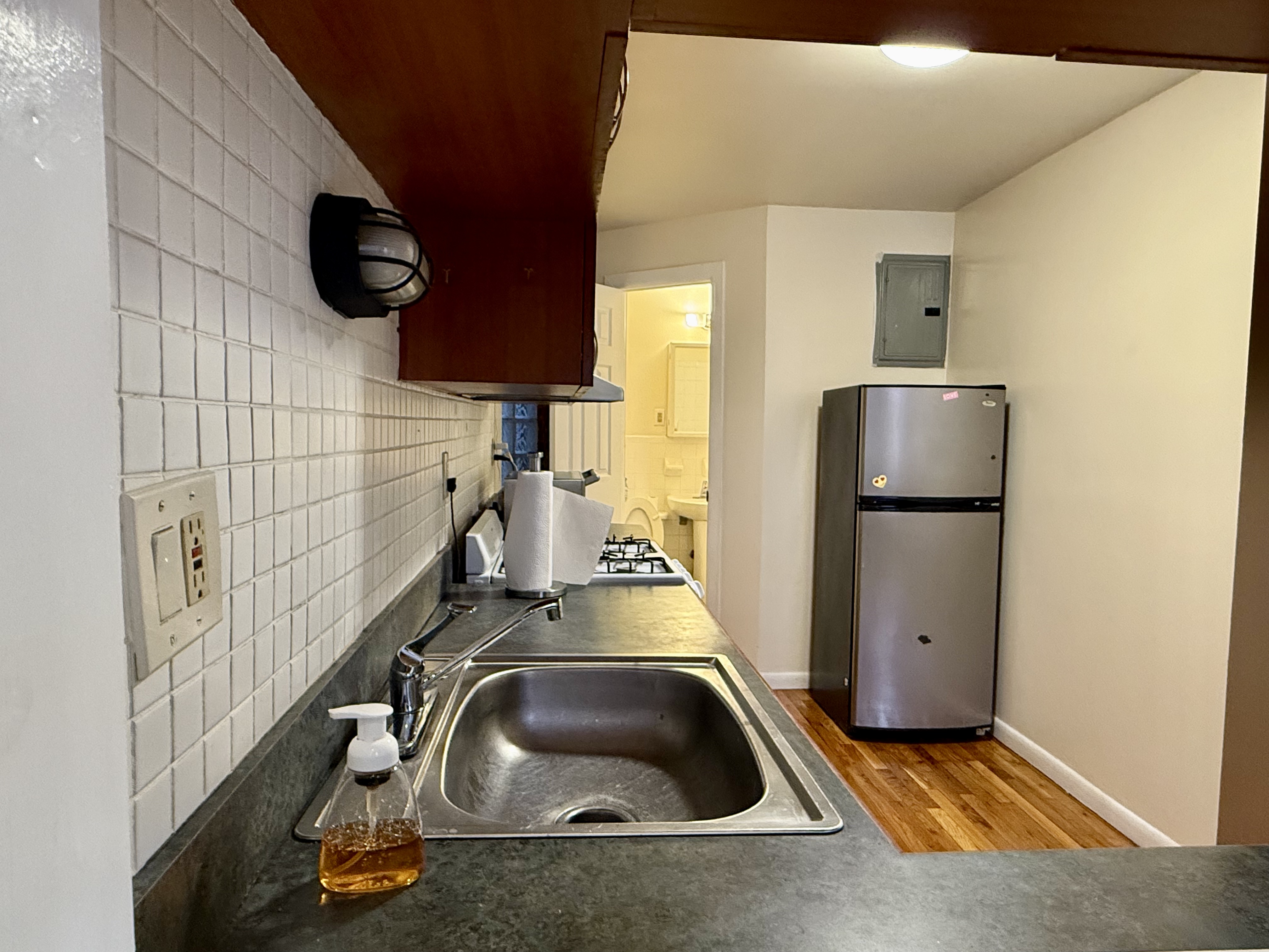 Park Avenue Manhattan, NY 10035 - Photo 3 of 14 a room with water heater and utility racks