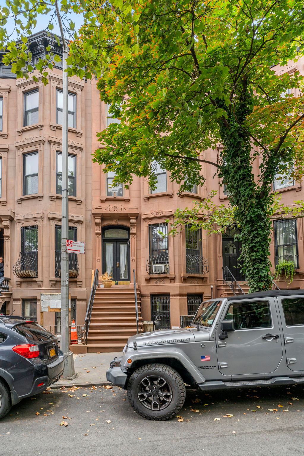 149 Sterling Place, Unit 3 Brooklyn, NY 11217 - Photo 8 of 9 a view of a car parked in front of a building