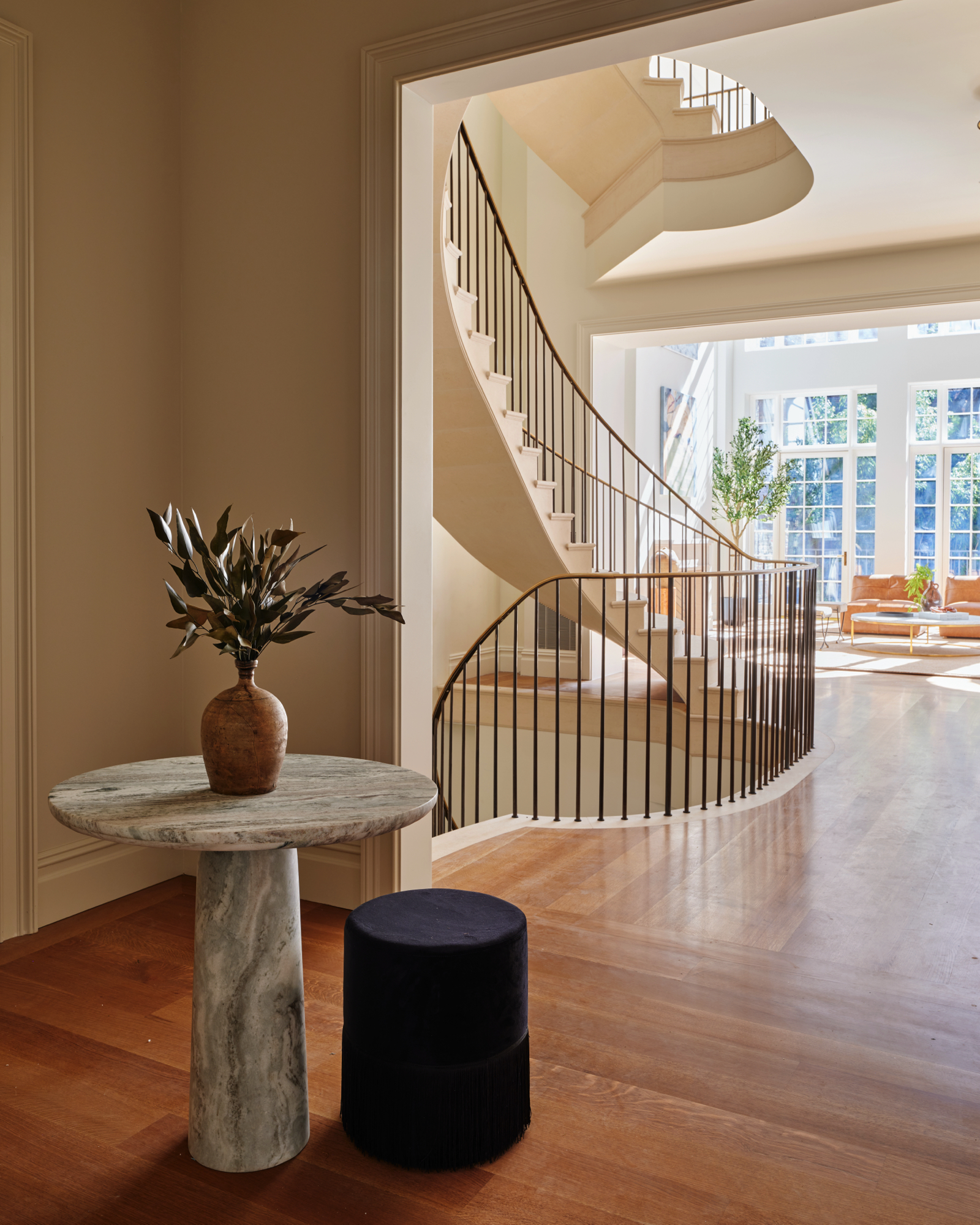 48-50 West 69th Street Manhattan, NY 10023 - Photo 4 of 33 a view of staircase with wooden floor