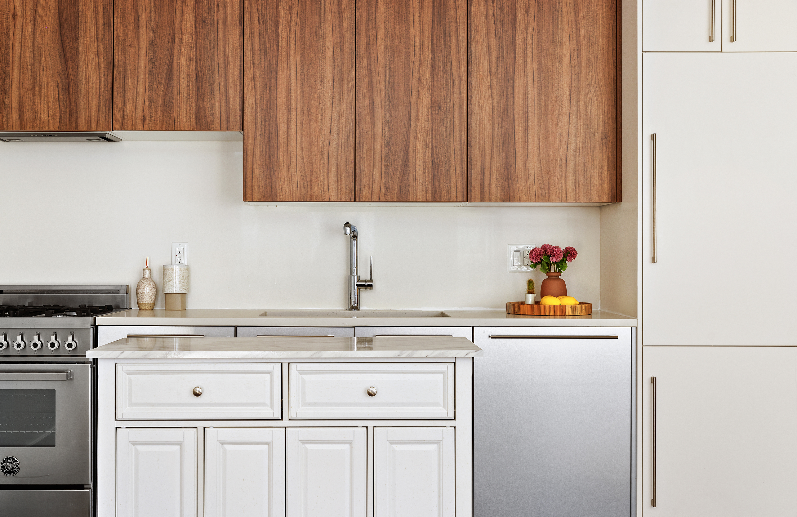 212 North 9th Street, Unit 3C Brooklyn, NY 11211 - Photo 4 of 16 a kitchen with stainless steel appliances white cabinets and a sink