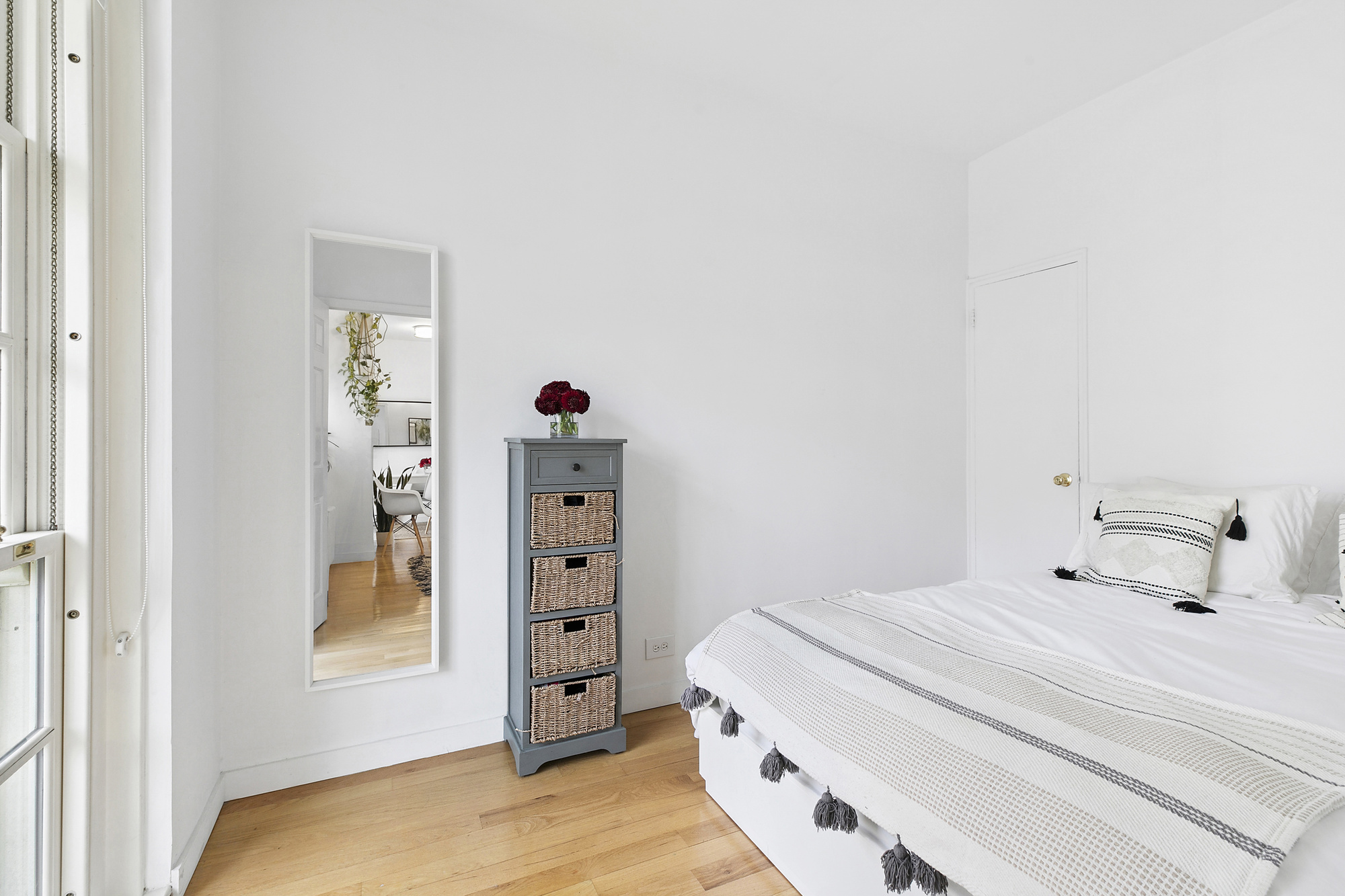 508 East 78th Street, Unit 6O Manhattan, NY 10075 - Photo 6 of 11 a bedroom with a bed and a cabinets