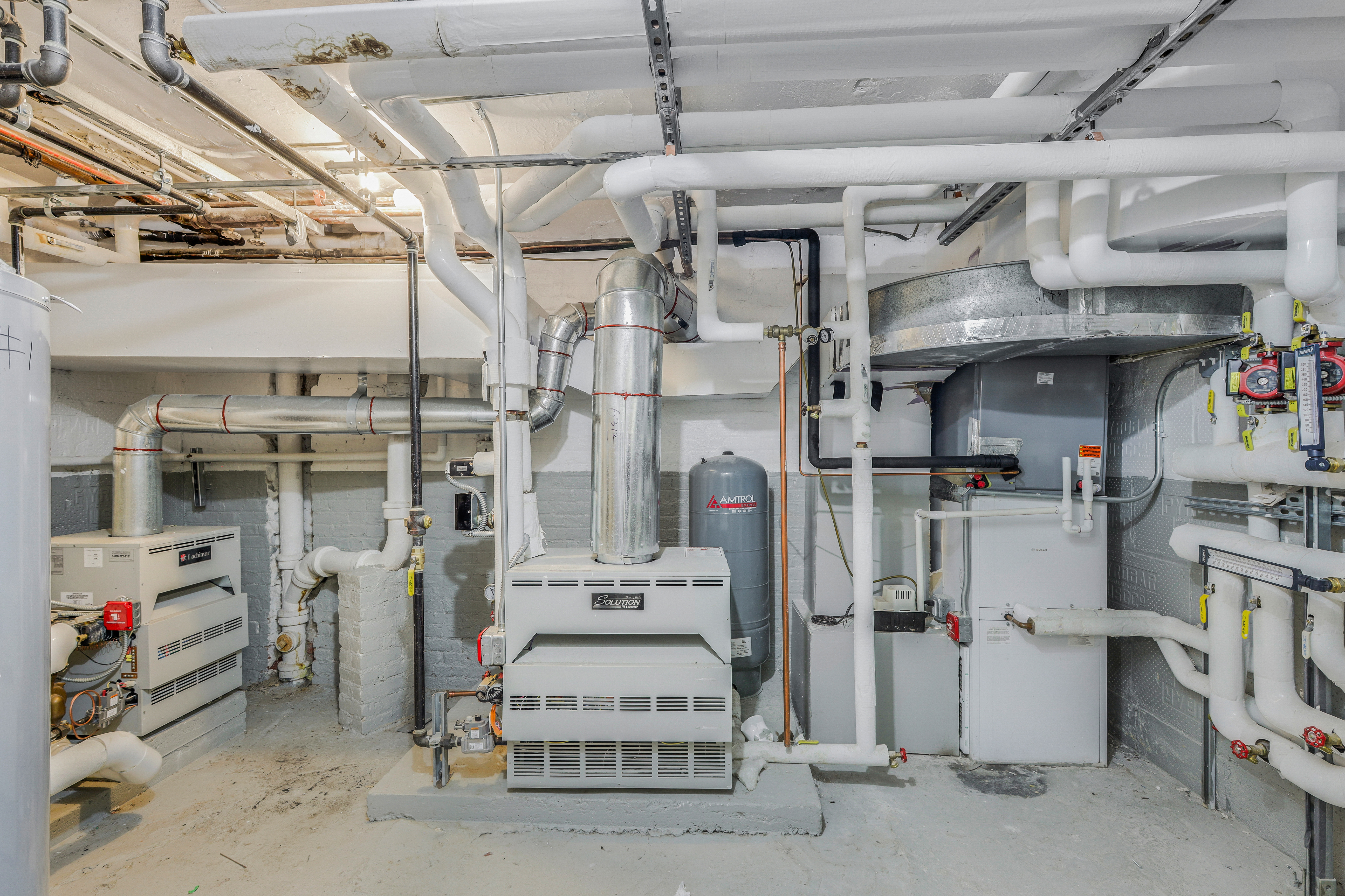 49 East 74th Street Manhattan, NY 10021 - Photo 5 of 11 a view of a storage room with shelves