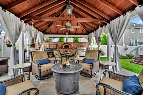 a front view of house with outdoor seating