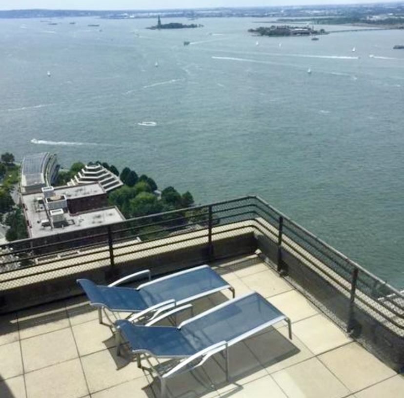 200 Rector Place, Unit 2C Manhattan, NY 10280 - Photo 19 of 19 a bathroom with a sink and a shower
