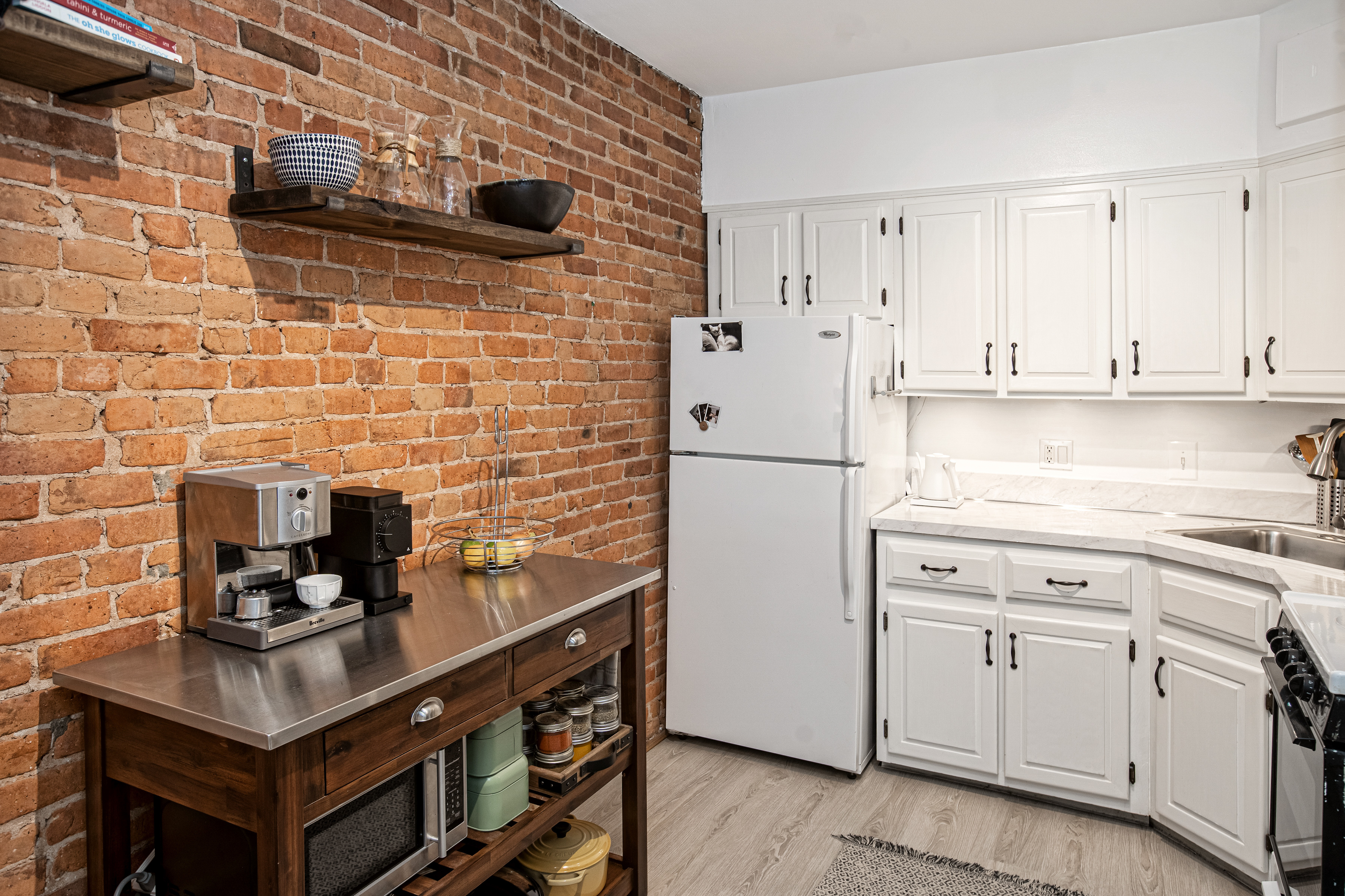 44 Sterling Place, Unit 2 Brooklyn, NY 11217 - Photo 3 of 9 a kitchen with stainless steel appliances and cabinets