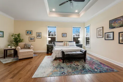 a bathroom with double sink and a mirror