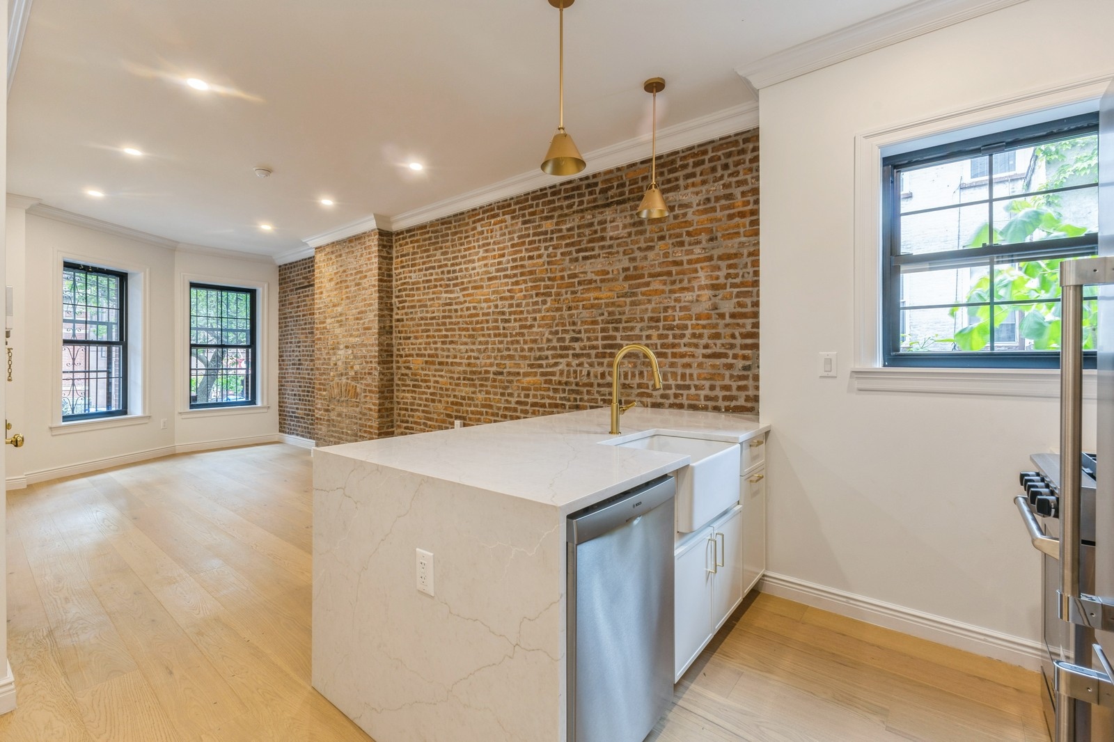 11 Park Place, Unit 1 Brooklyn, NY 11217 - Photo 5 of 16 a kitchen with a stove and a window