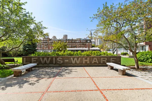 a view of a bench next to a yard