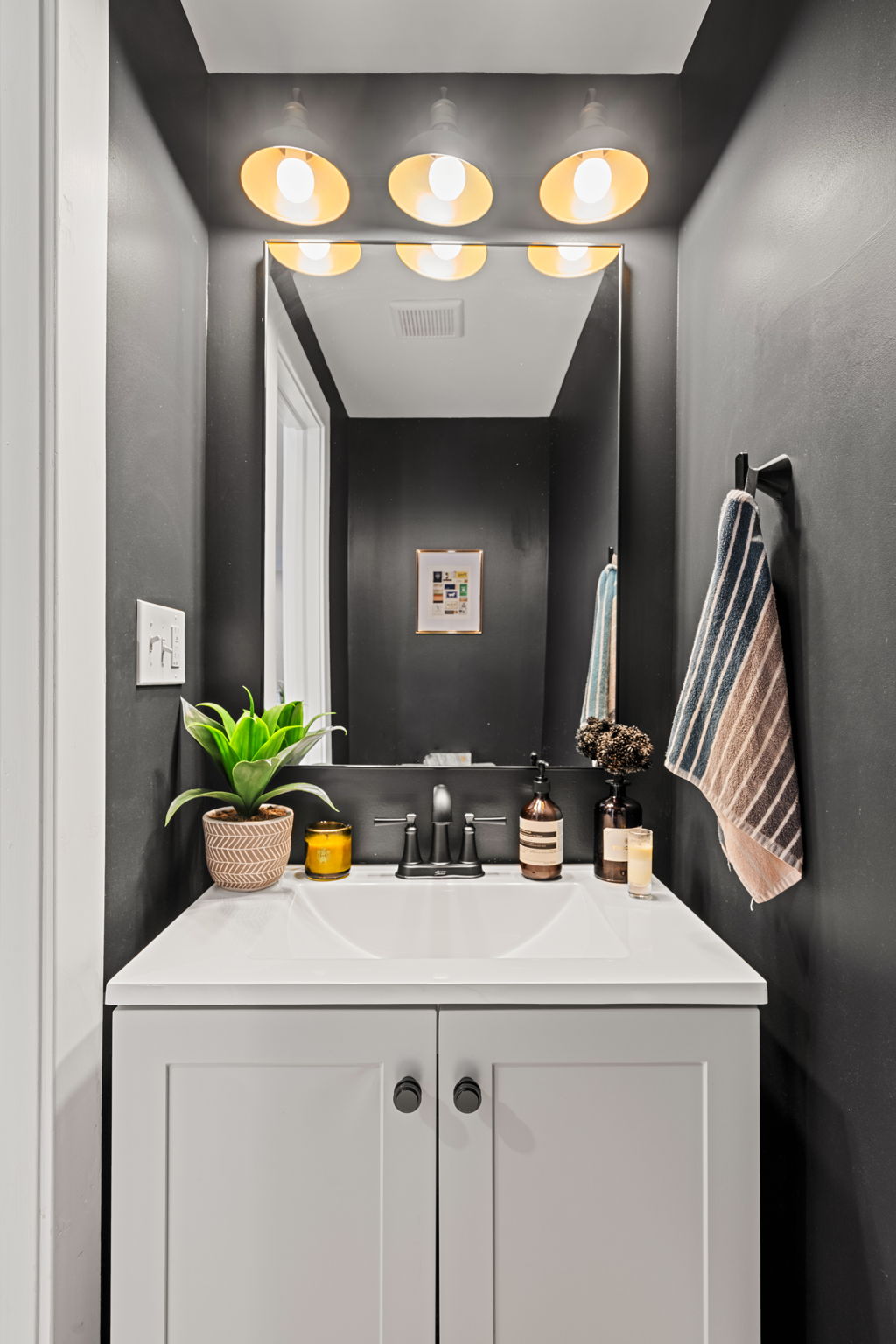 1934 Pemberton Street Philadelphia, PA 19146 - Photo 11 of 50 a bathroom with a sink and a mirror
