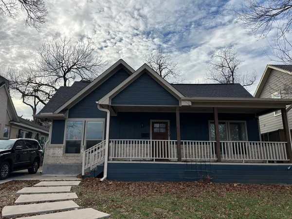 a view of a house with a deck