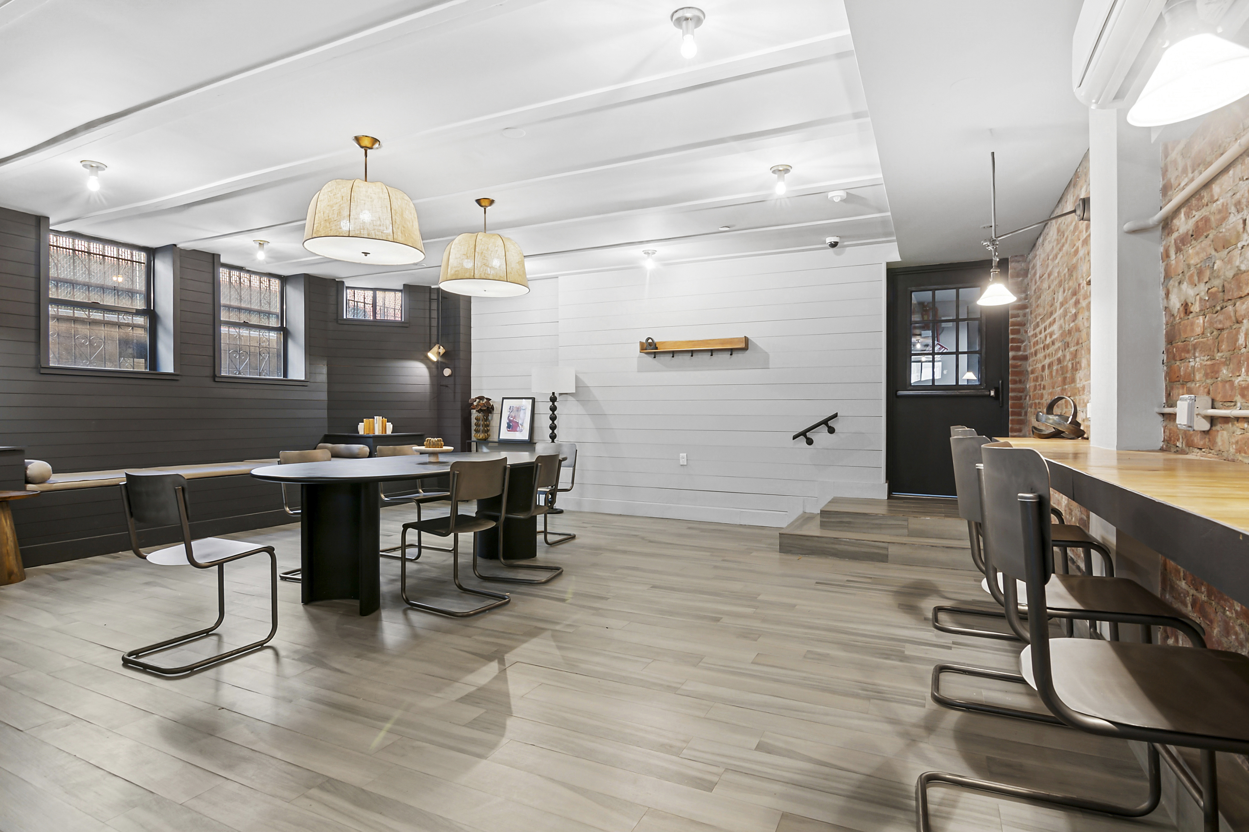 180 Bainbridge Street, Unit 111 Brooklyn, NY 11233 - Photo 14 of 25 a view of a dining room with furniture