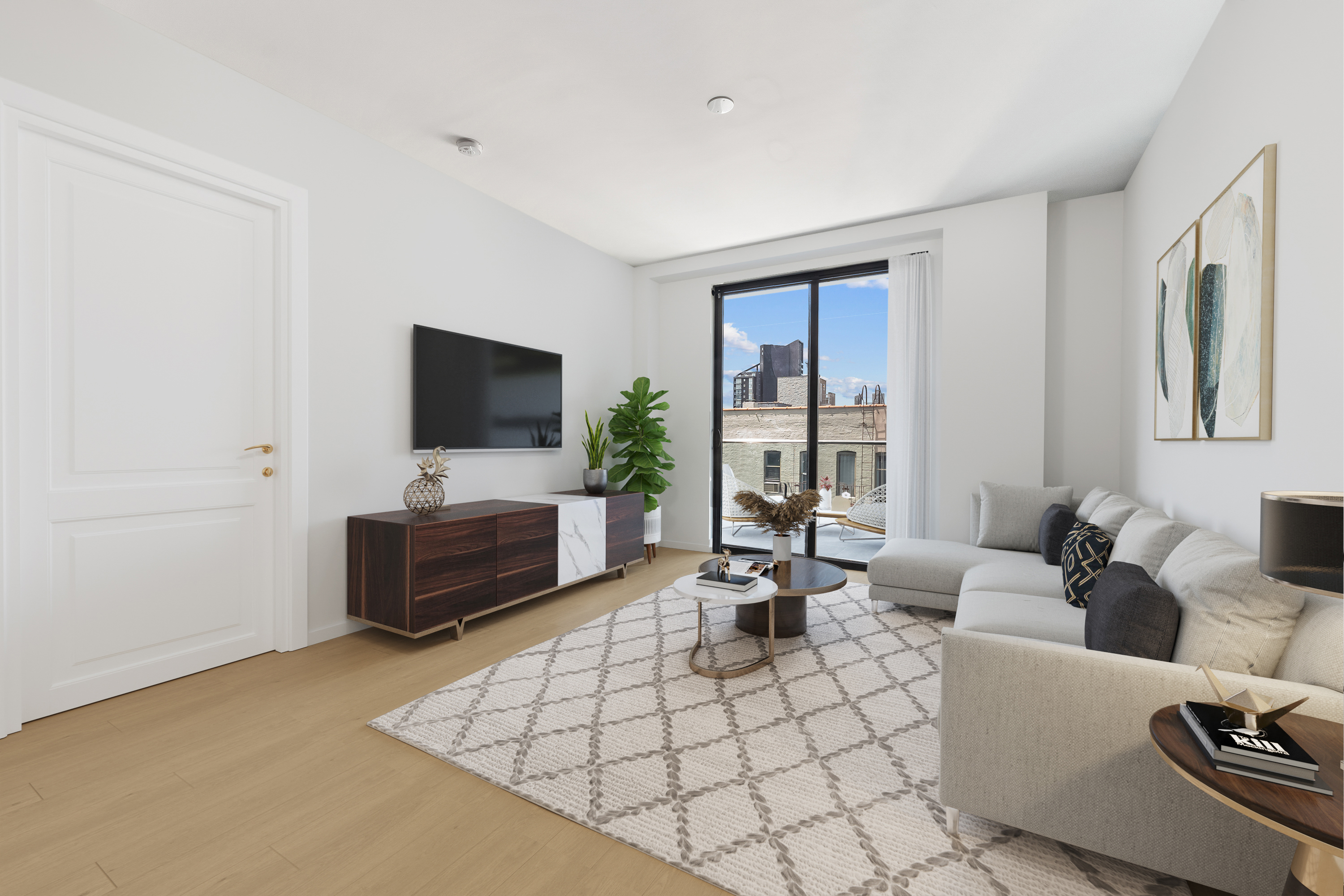 14-33 31st Avenue, Unit 5H Queens, NY 11106 - Photo 1 of 10 a living room with furniture and a flat screen tv