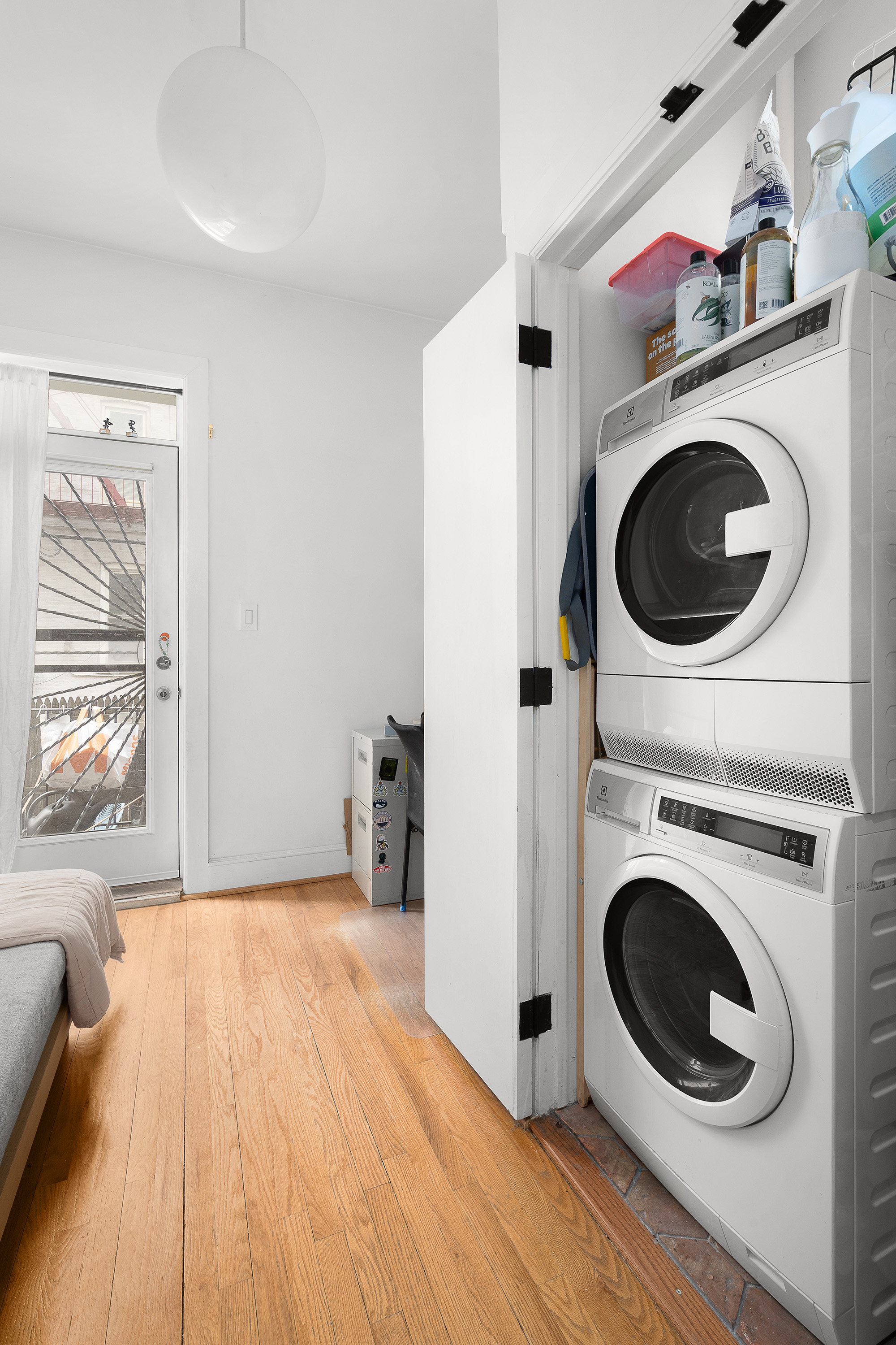 226 St James Place, Unit 1R Brooklyn, NY 11238 - Photo 5 of 14 a view of a bedroom with washer and dryer