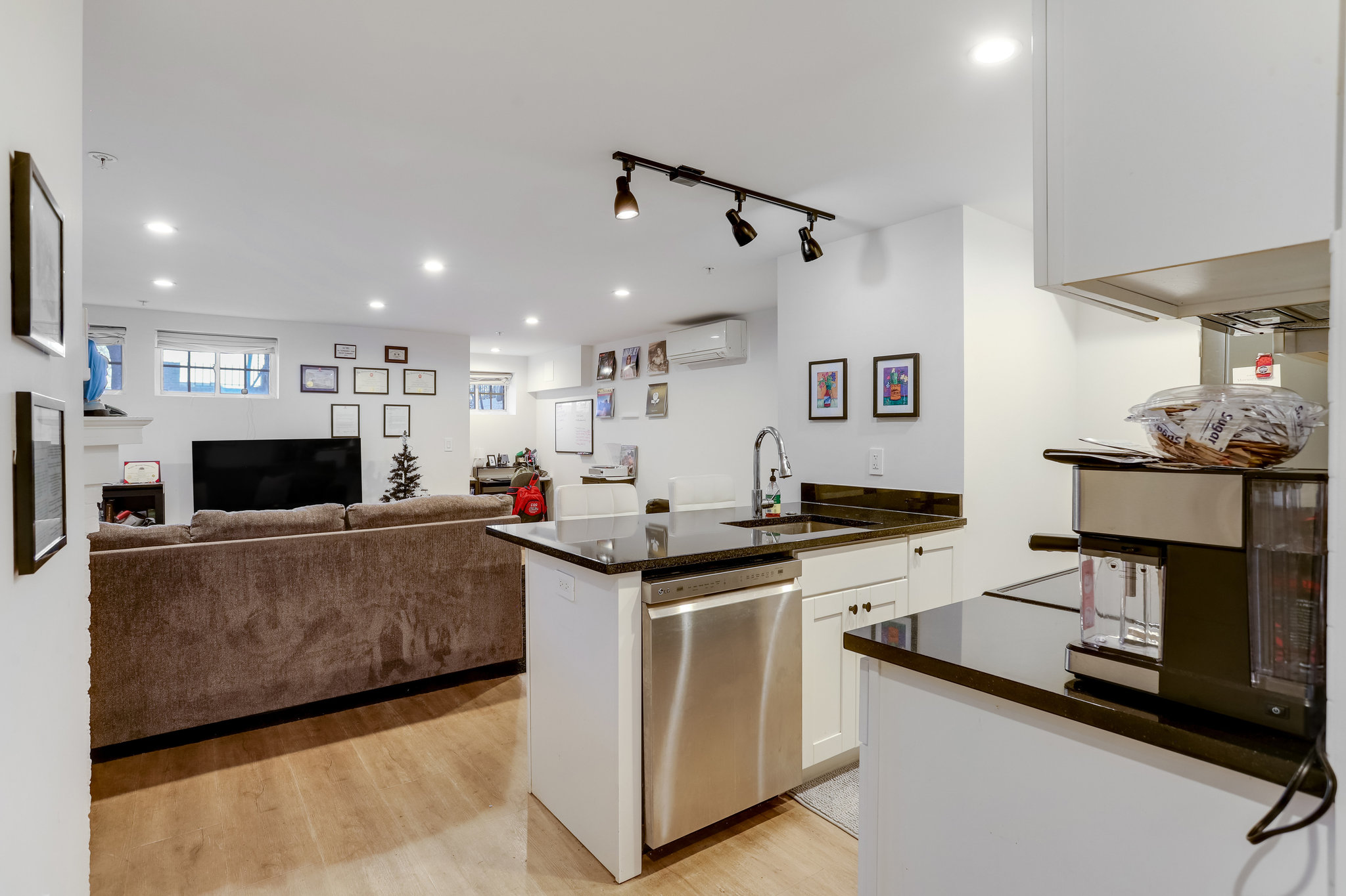 1920 35th Street Northwest Washington, DC 20007 - Photo 37 of 54 a kitchen with stainless steel appliances granite countertop a sink and a stove