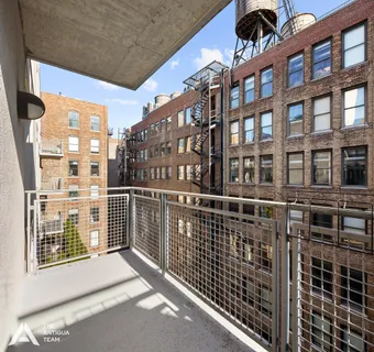 a balcony view with a glass door
