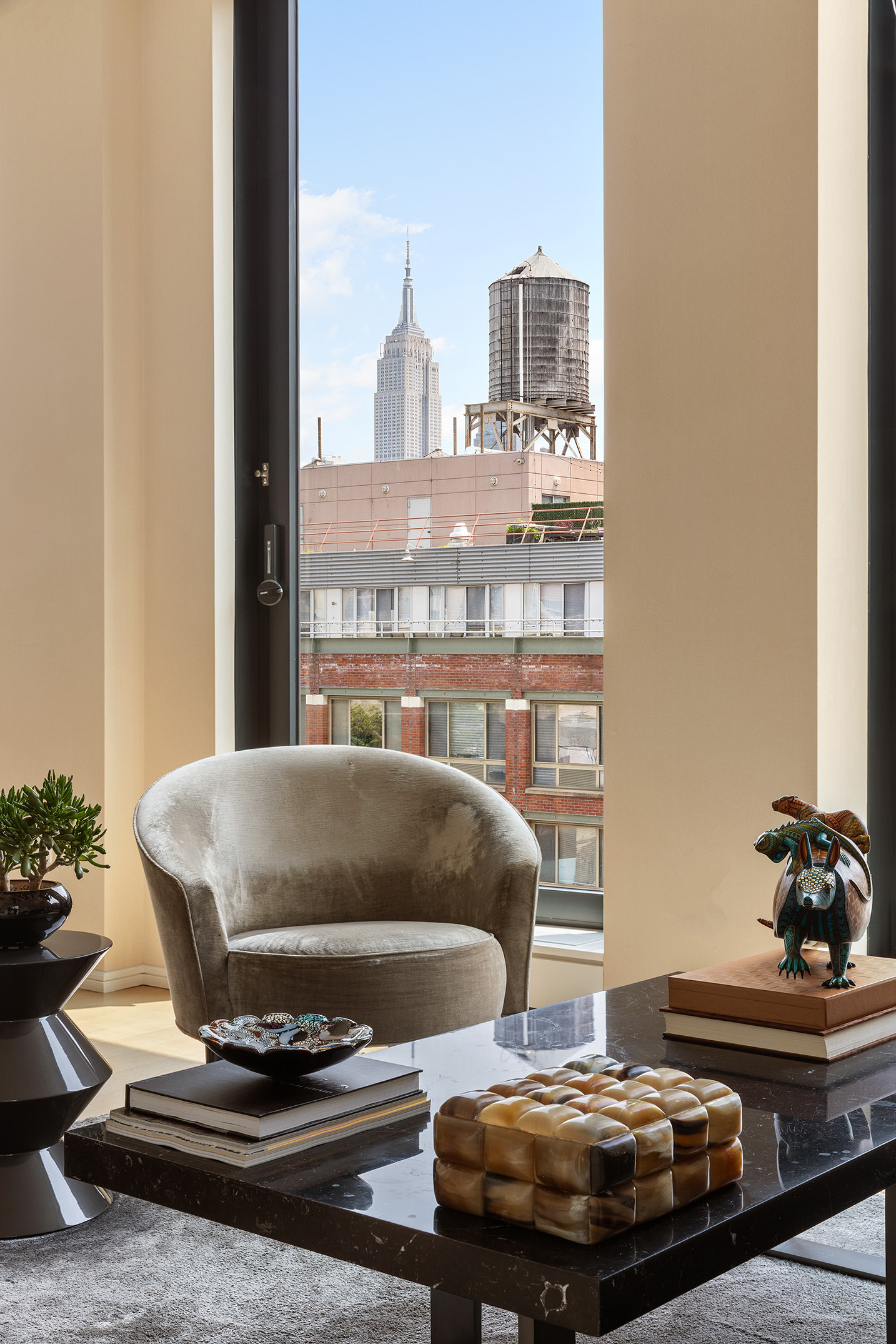 505 West 19th Street, Unit 7B Manhattan, NY 10011 - Photo 3 of 16 a living room with furniture and a rug