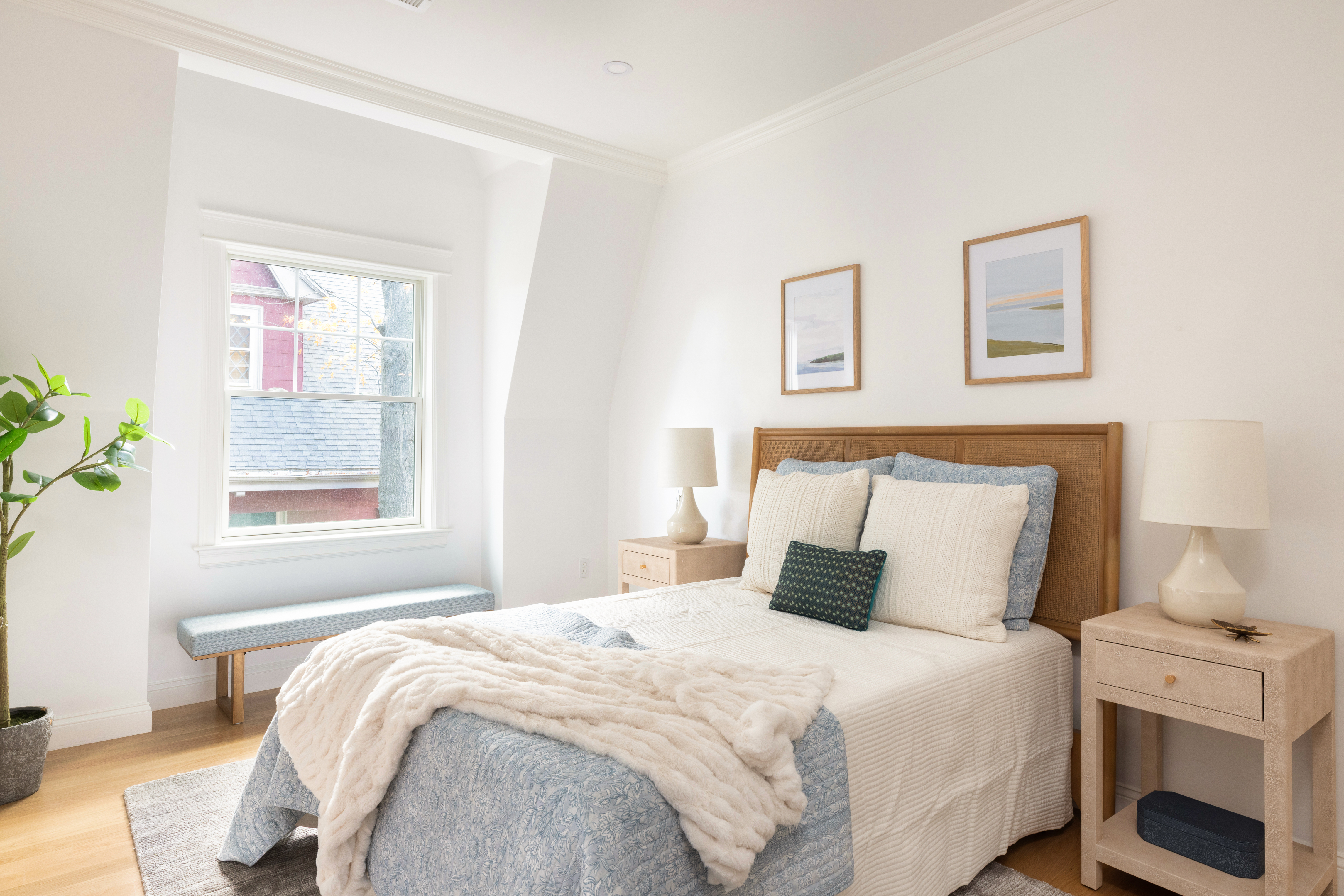 85 Naples Road, Unit 1 Brookline, MA 02446 - Photo 22 of 32 a bedroom with a bed and a window