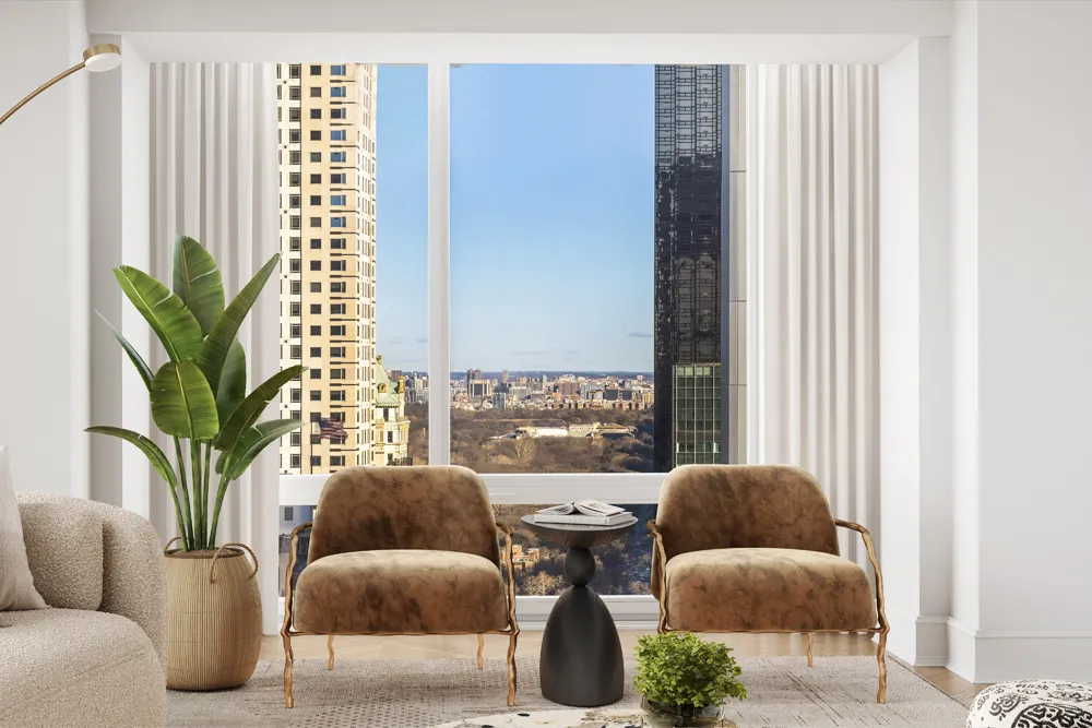 a living room with furniture and a potted plant