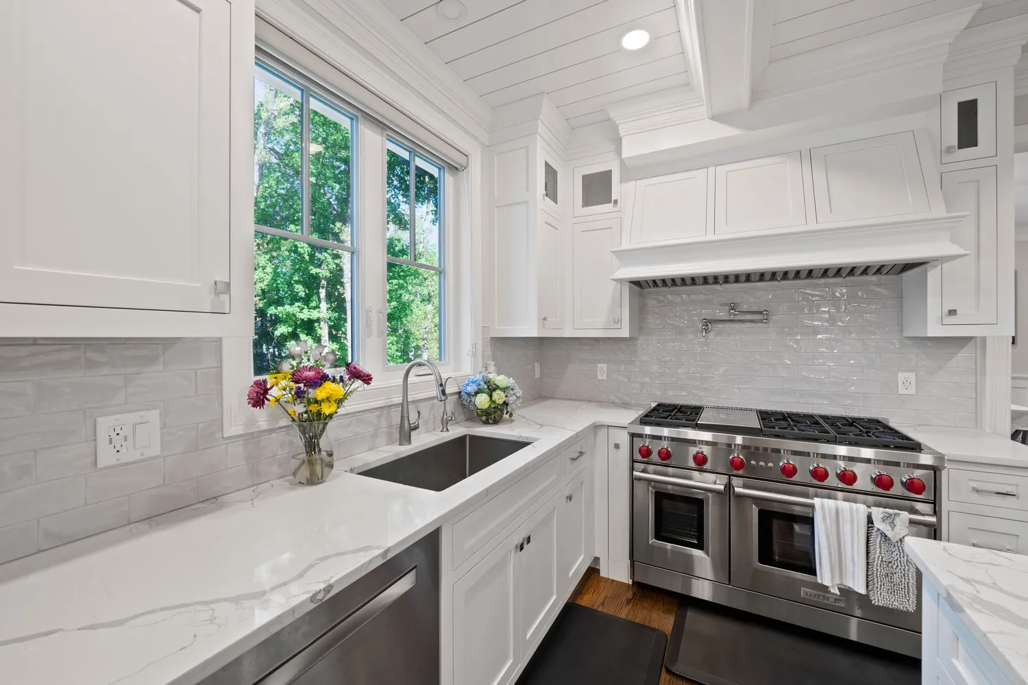 a living room with fireplace furniture and a flat screen tv
