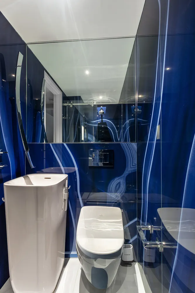 a view of a patio with couches and potted plants