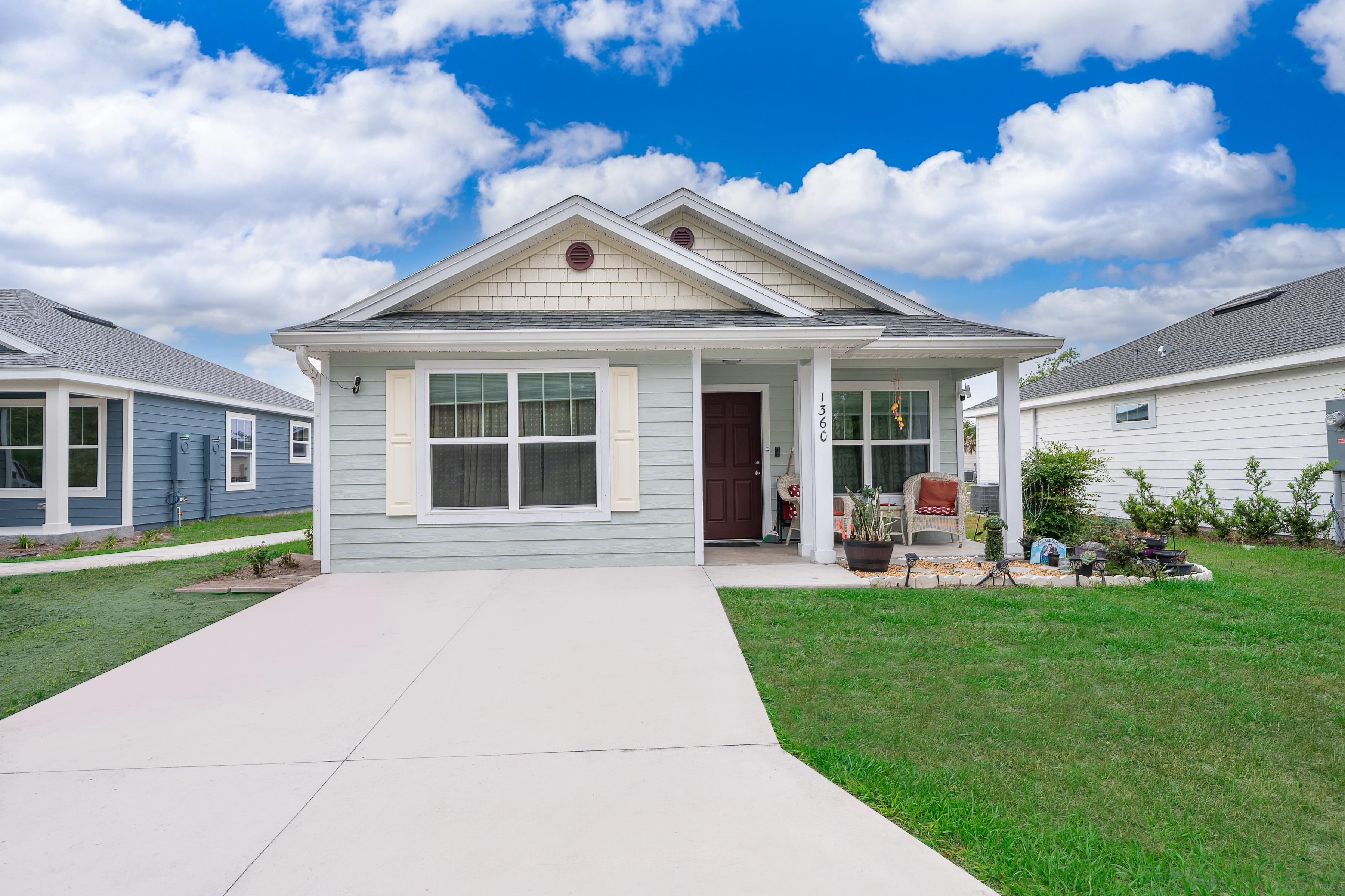 1360 Cottage Circle Tavares, FL 32778 - Photo 2 of 25 a front view of a house with a yard