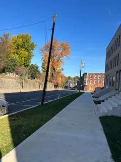 a view of a building with a yard