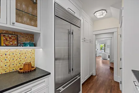 a view of a hallway with washer and dryer