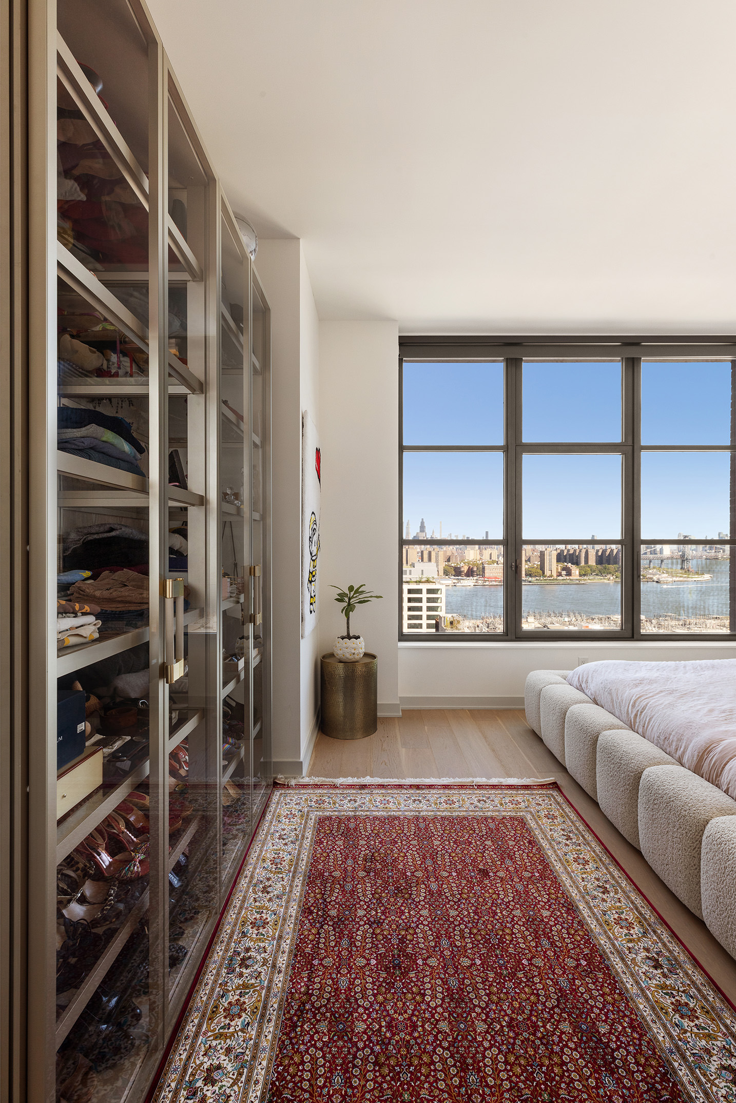 115 York Street, Unit 17A Brooklyn, NY 11201 - Photo 7 of 12 a living room with furniture and a large window