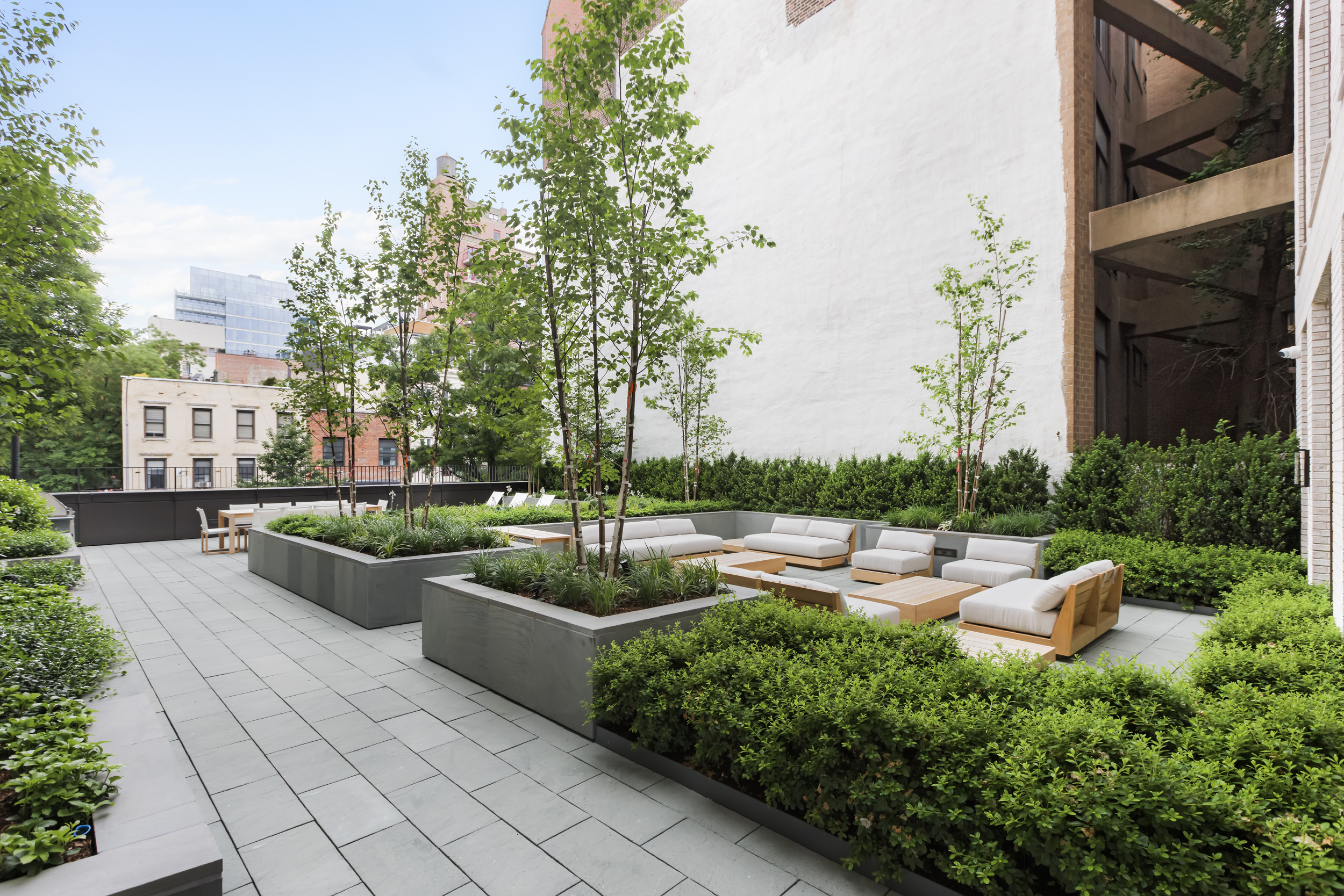 150 Barrow Street, Unit 2B Manhattan, NY 10014 - Photo 8 of 14 a view of a patio with couches and a fire pit