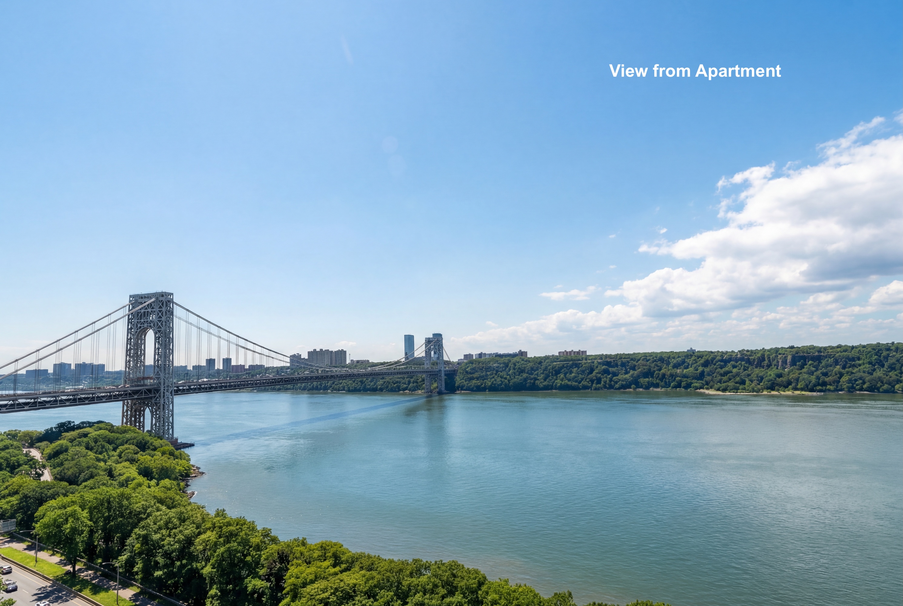 180 Cabrini Boulevard, Unit 61 Manhattan, NY 10033 - Photo 2 of 33 a view of a lake with houses in the back