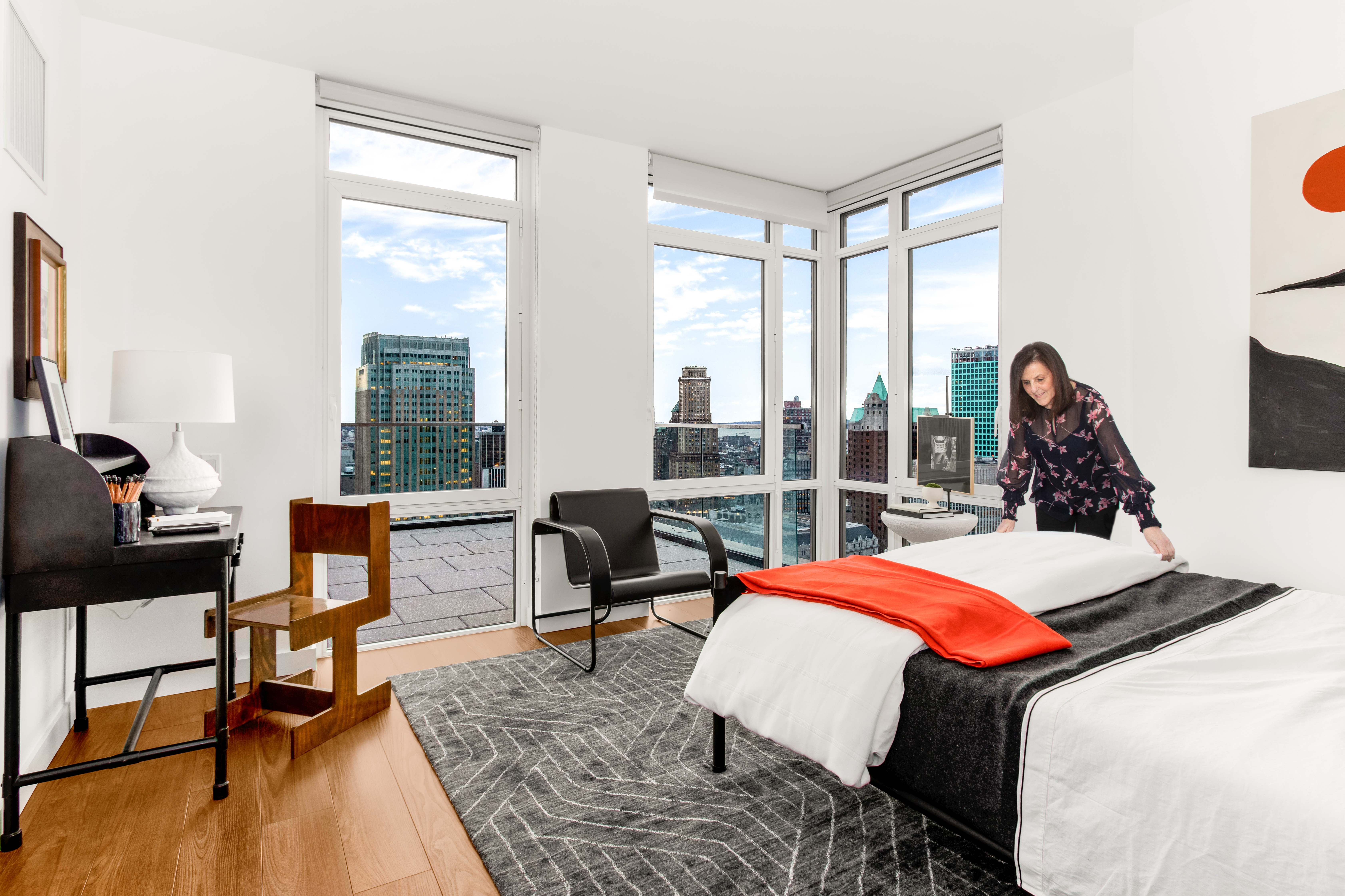 120 Nassau Street, Unit 29D Brooklyn, NY 11201 - Photo 3 of 12 a living room with furniture and a floor to ceiling window