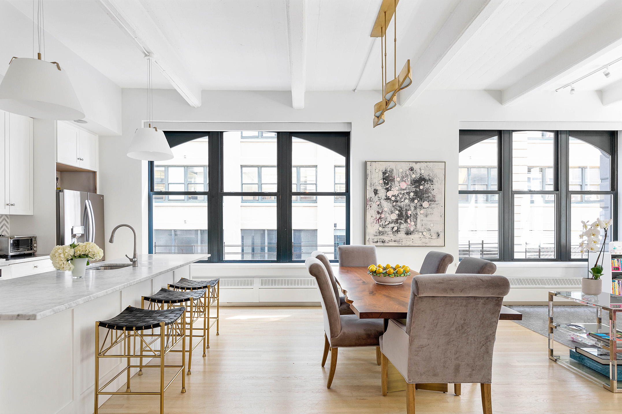 30 Main Street, Unit 3C Brooklyn, NY 11201 - Photo 3 of 18 a view of a dining room with furniture a chandelier and wooden floor
