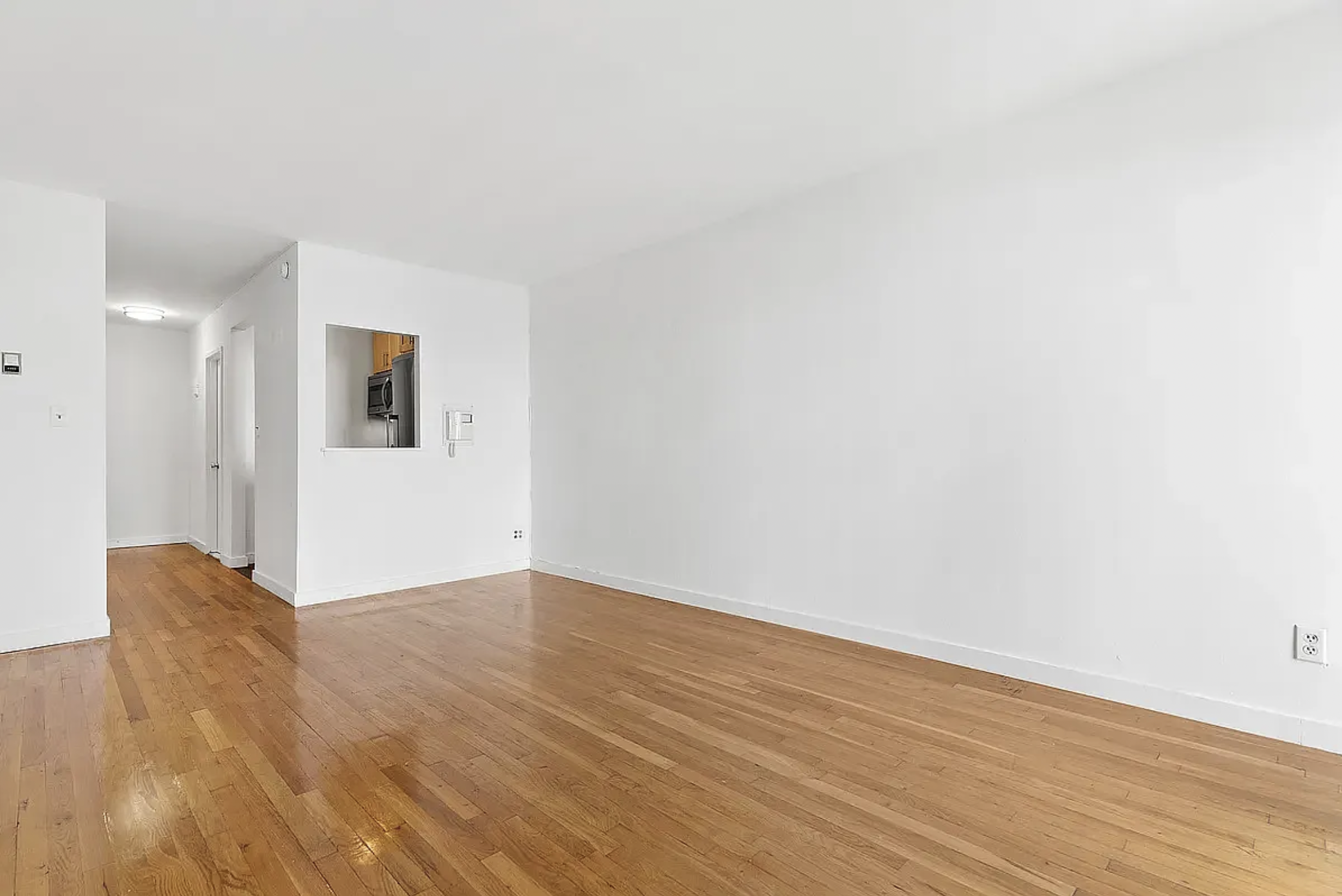 343 East 76th Street, Unit 5D Manhattan, NY 10021 - Photo 2 of 7 a view of livingroom with hardwood