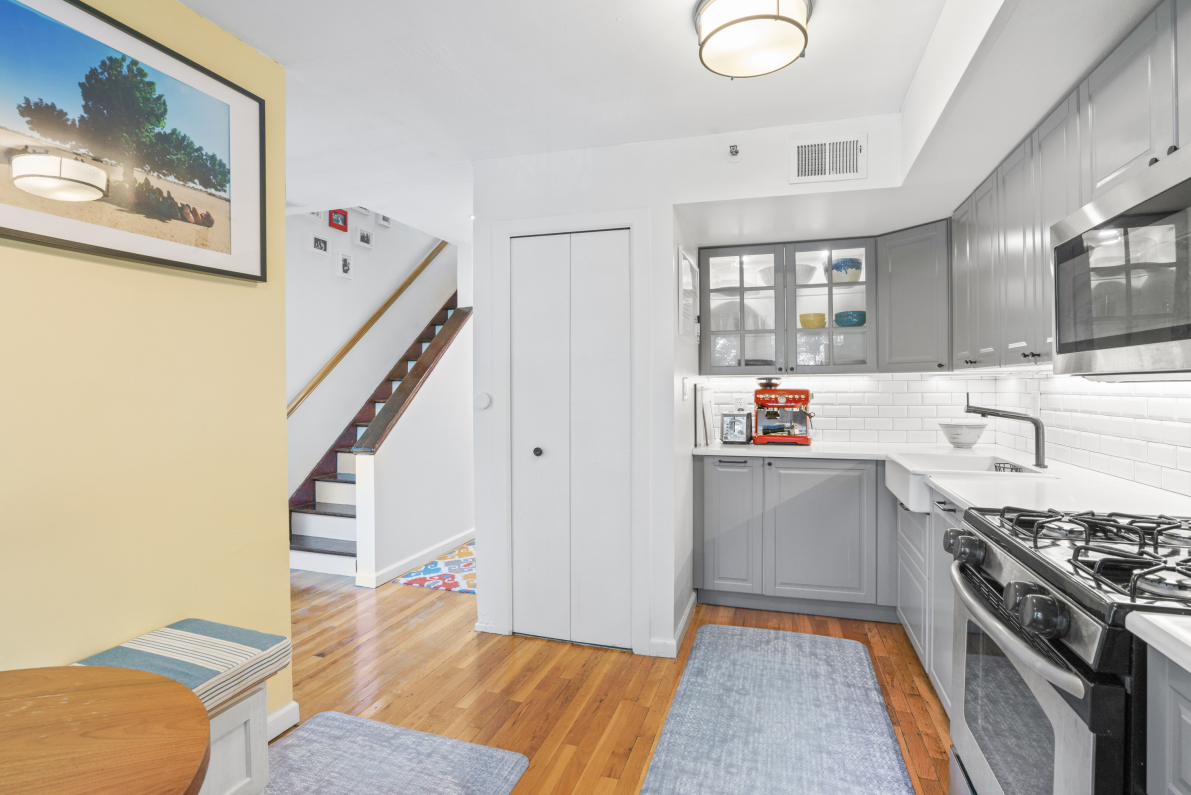 95 Vanderbilt Avenue, Unit AA Brooklyn, NY 11205 - Photo 3 of 11 a kitchen with stainless steel appliances granite countertop a stove and a refrigerator