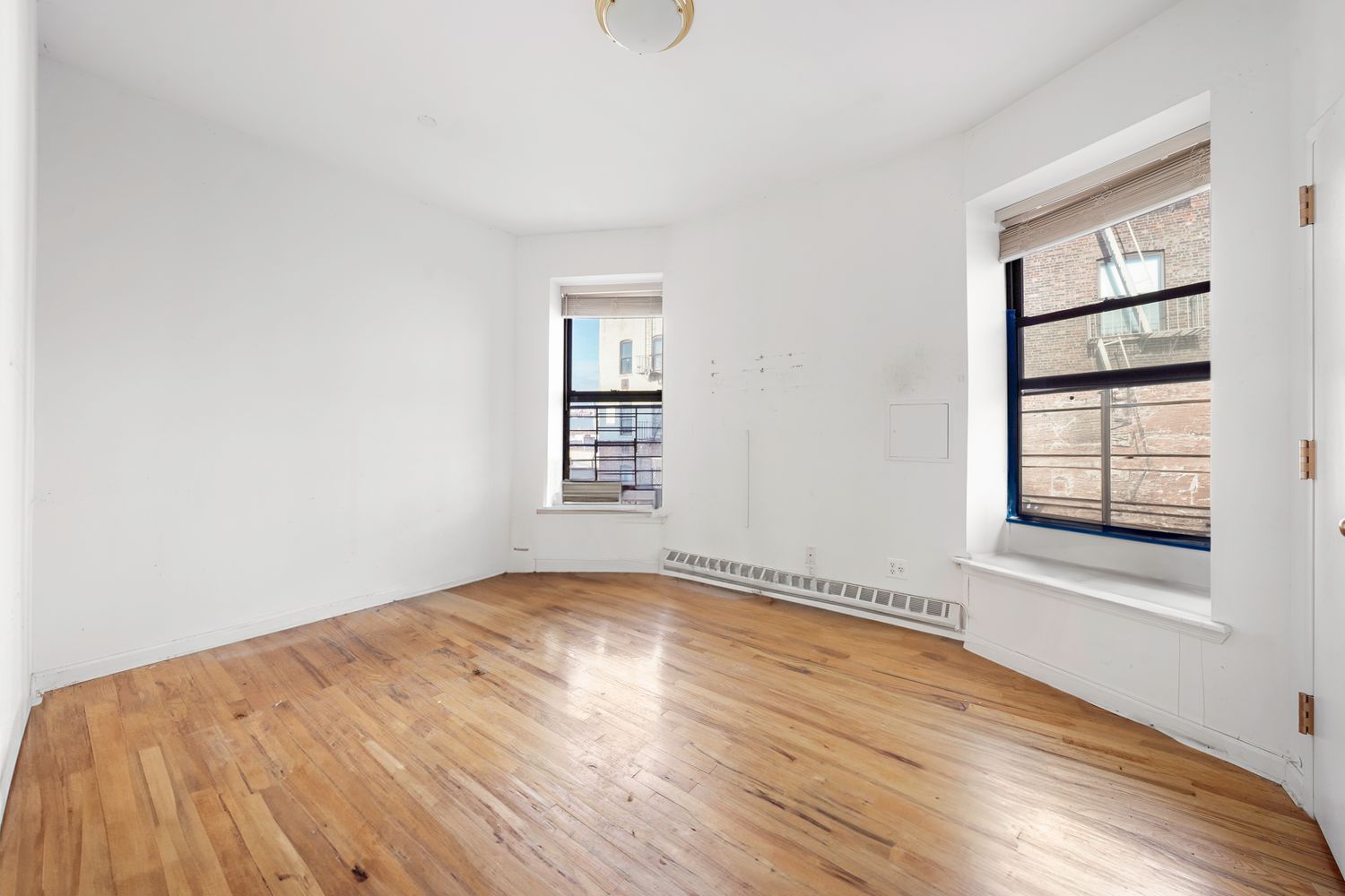 an empty room with windows