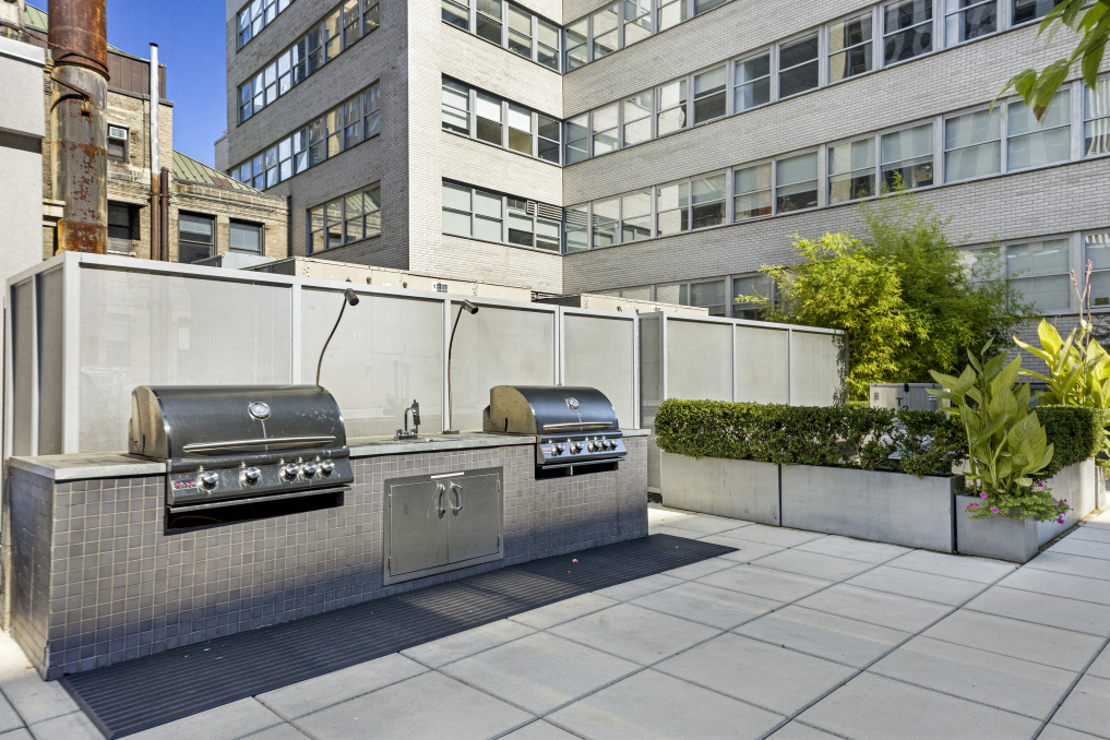 59 John Street, Unit 4H Manhattan, NY 10038 - Photo 14 of 19 a view of a building with entryway